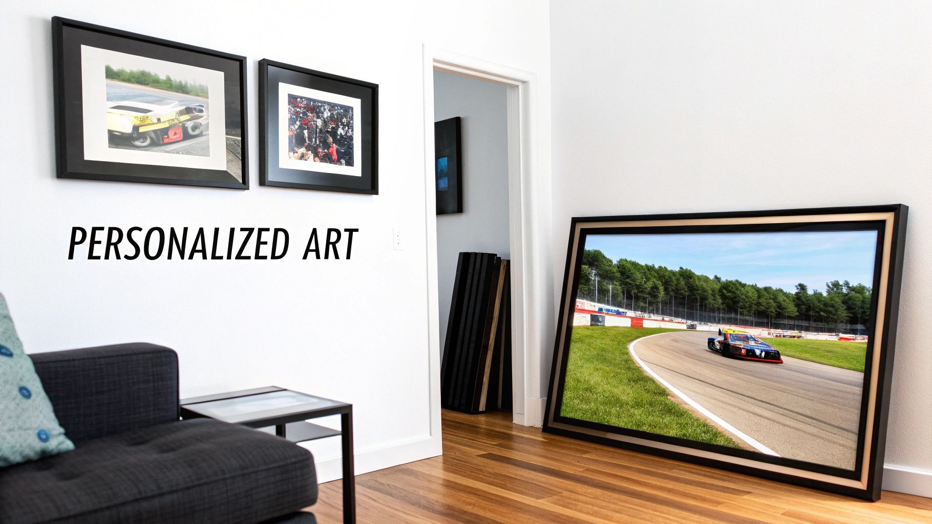 A room decorated with personalized framed art featuring race cars and a racing track.