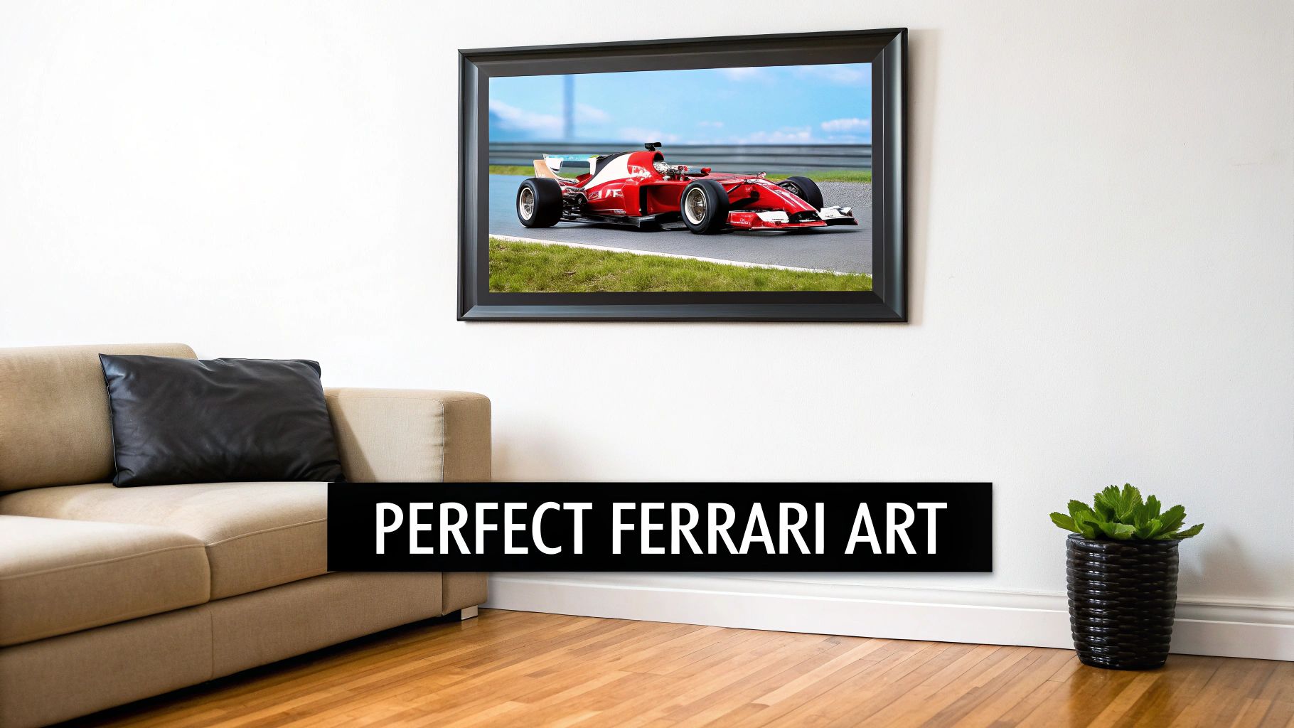 A large framed print of a red Ferrari F1 race car on a track above a beige couch.