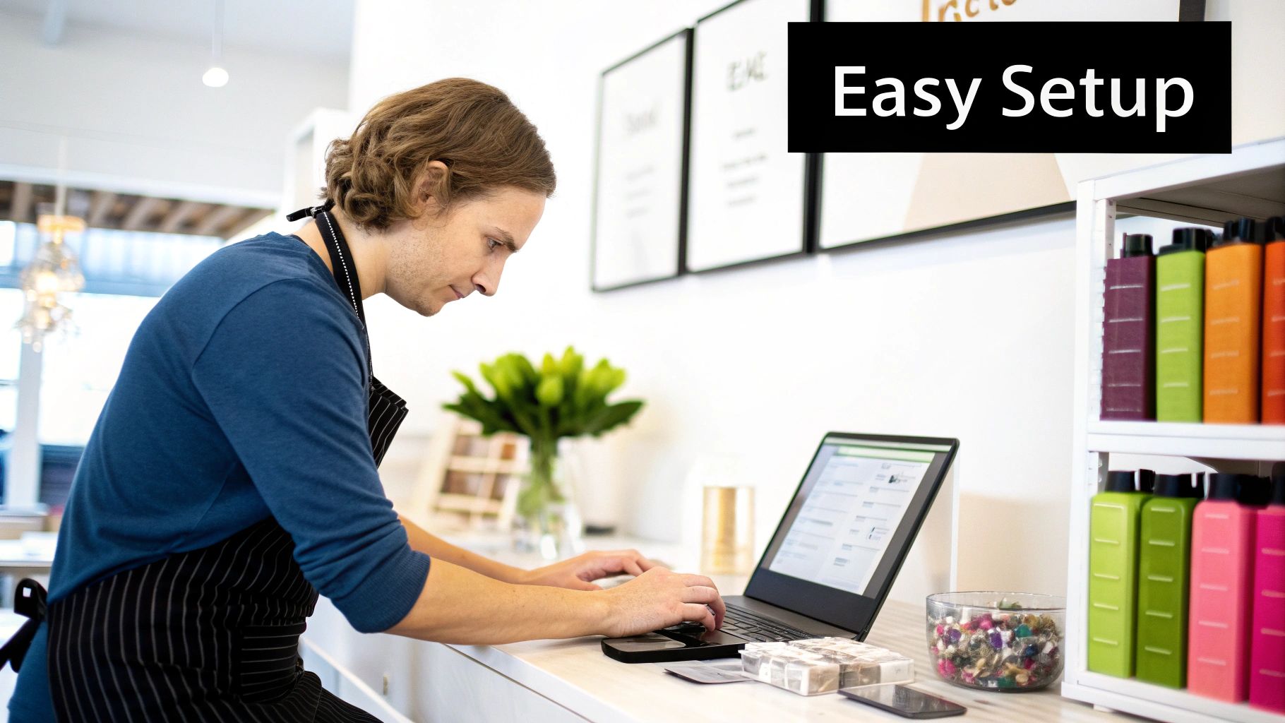 A person using a laptop to design a website with a visual editor, symbolizing the ease of use of a website builder.