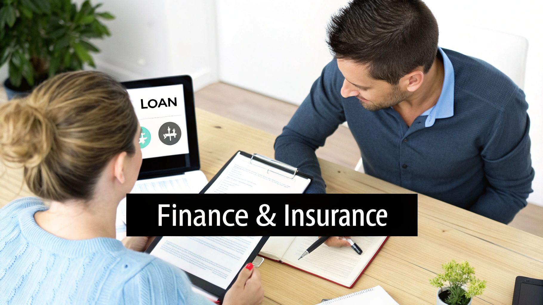 Financial advisor discussing loan options with client during finance and insurance consultation meeting