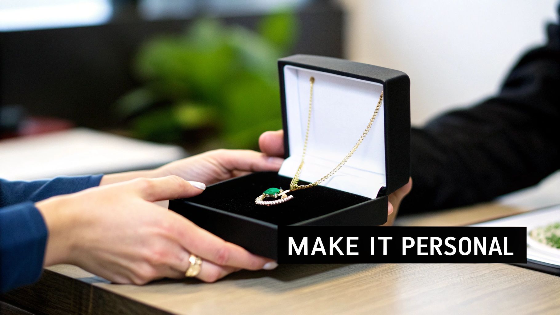 Couple looking at a custom jewellery design on a tablet