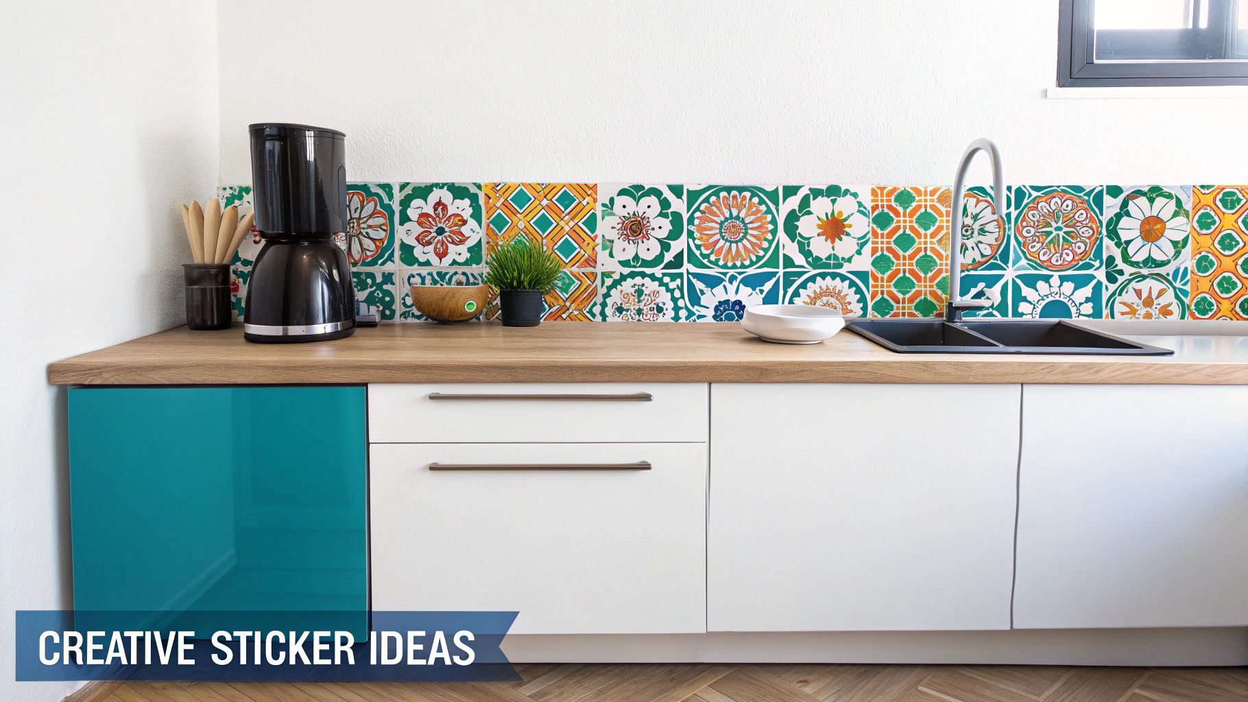 Bright modern kitchen with a coffee maker, patterned backsplash, and teal and white cabinets.