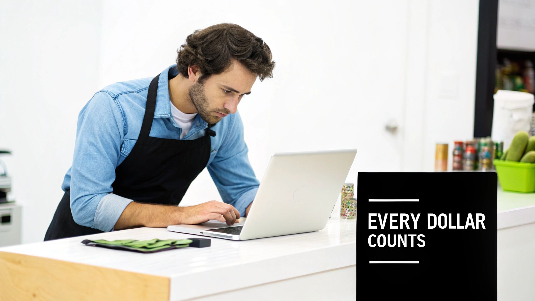 A small business owner looking worriedly at a graph showing declining profits.