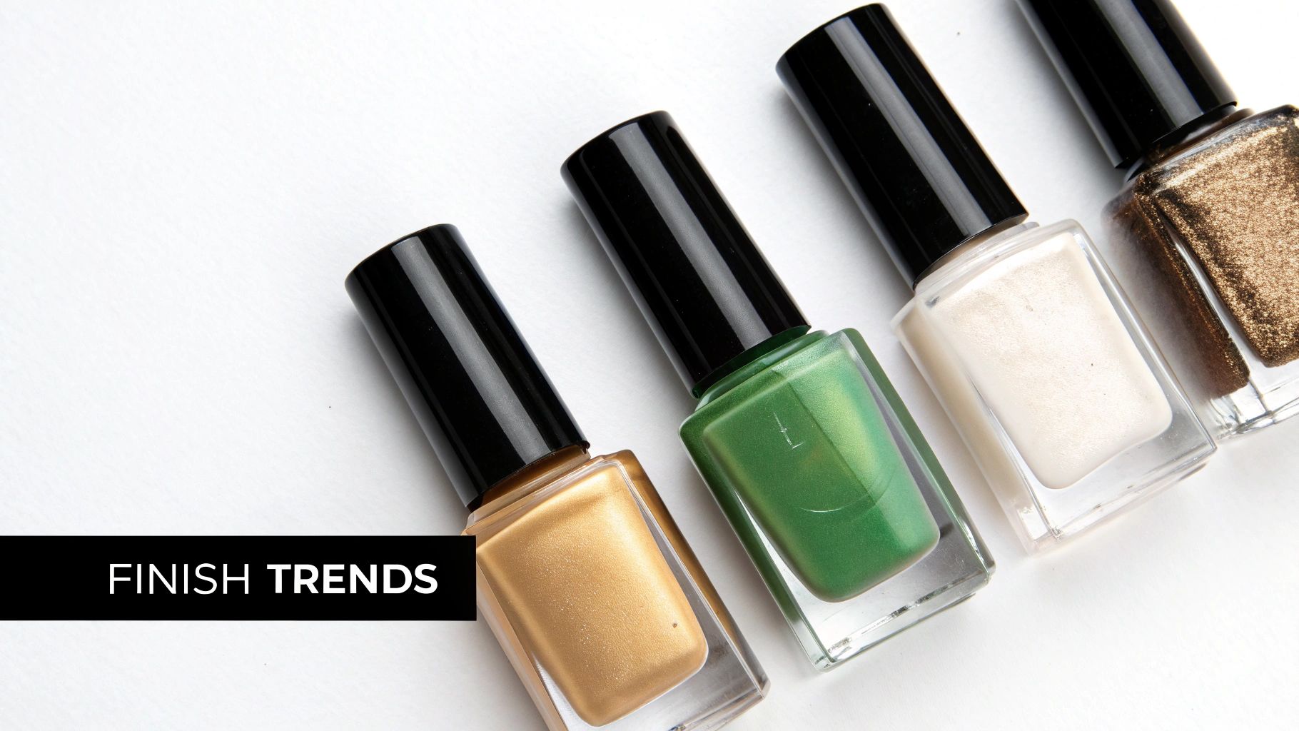 A close-up shot of multiple nail polish bottles showing different finishes like matte, shimmer, and chrome, against a clean background.