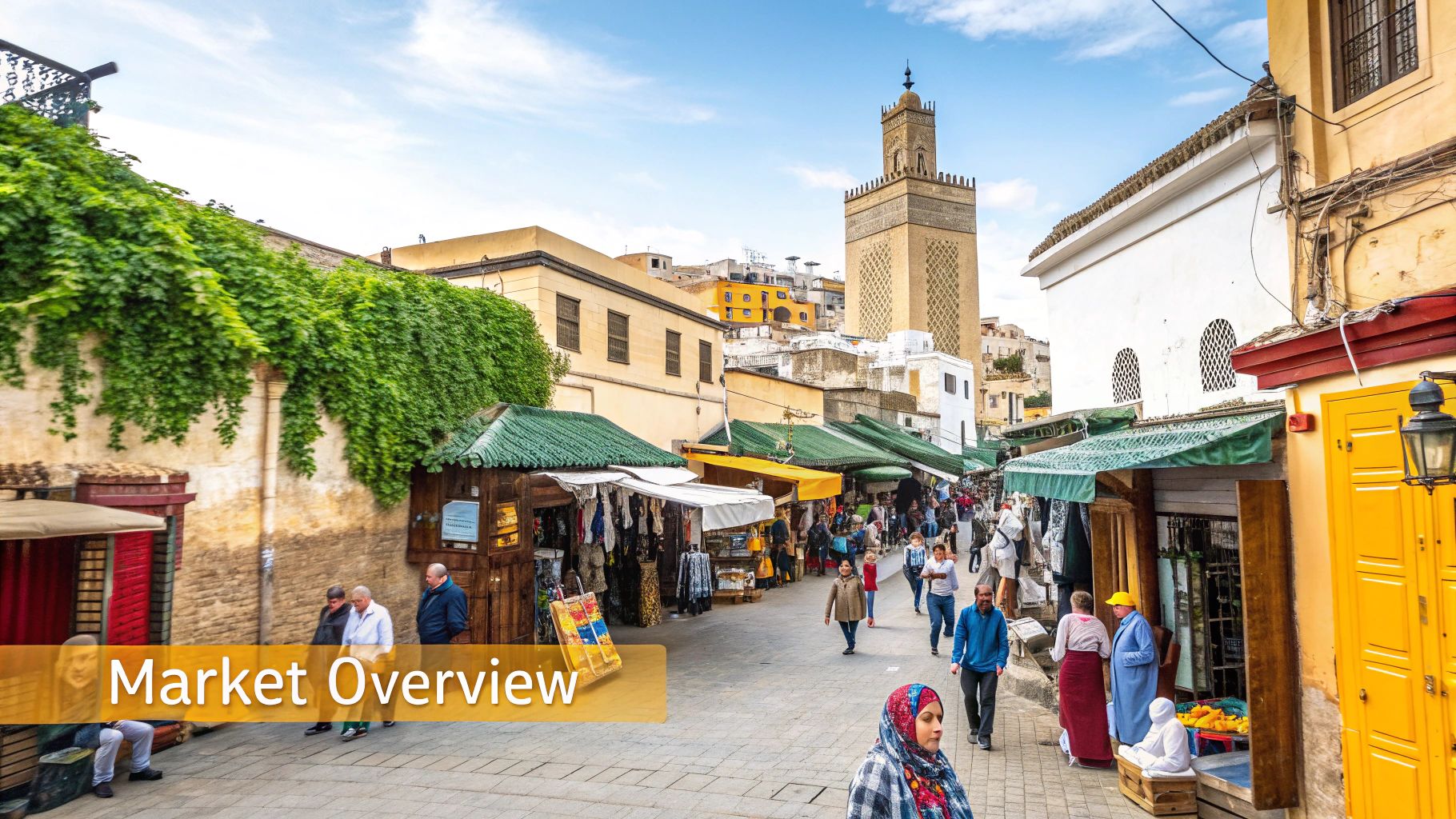Historic Moroccan building with intricate tilework and wooden doors in Fez
