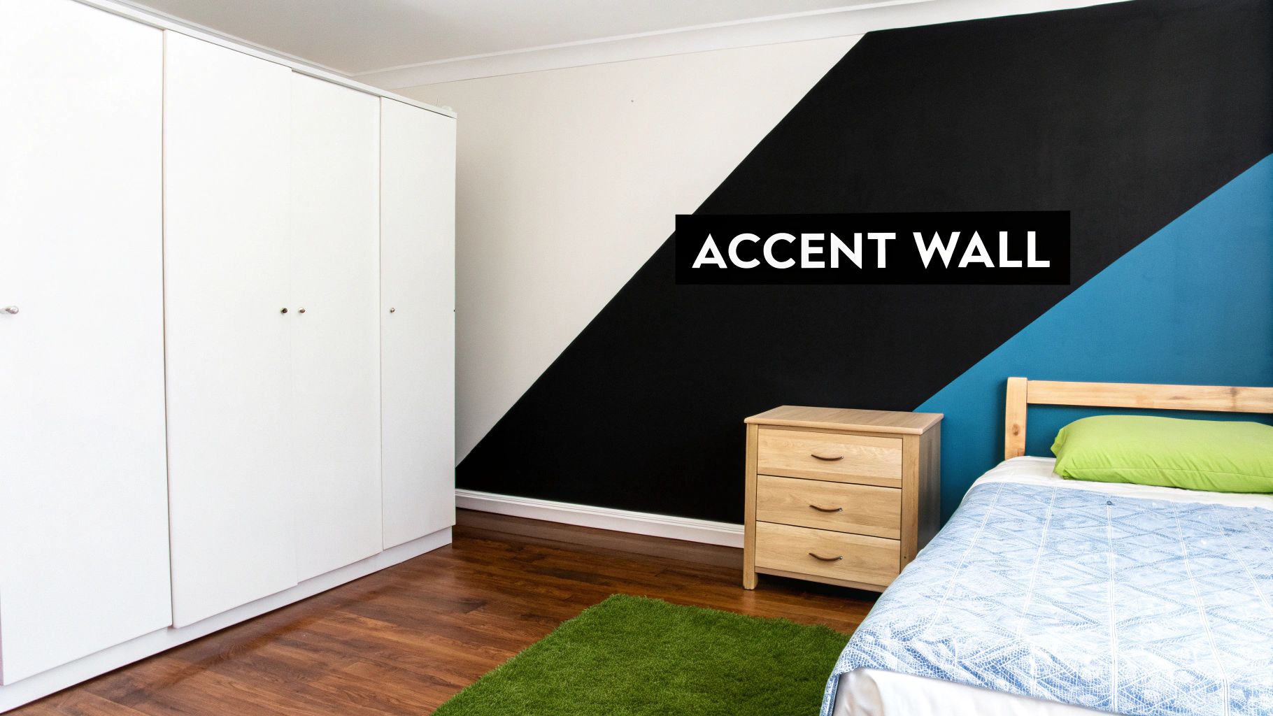 A modern bedroom featuring an accent wall painted in black, white, and blue, with a bed and wardrobe.