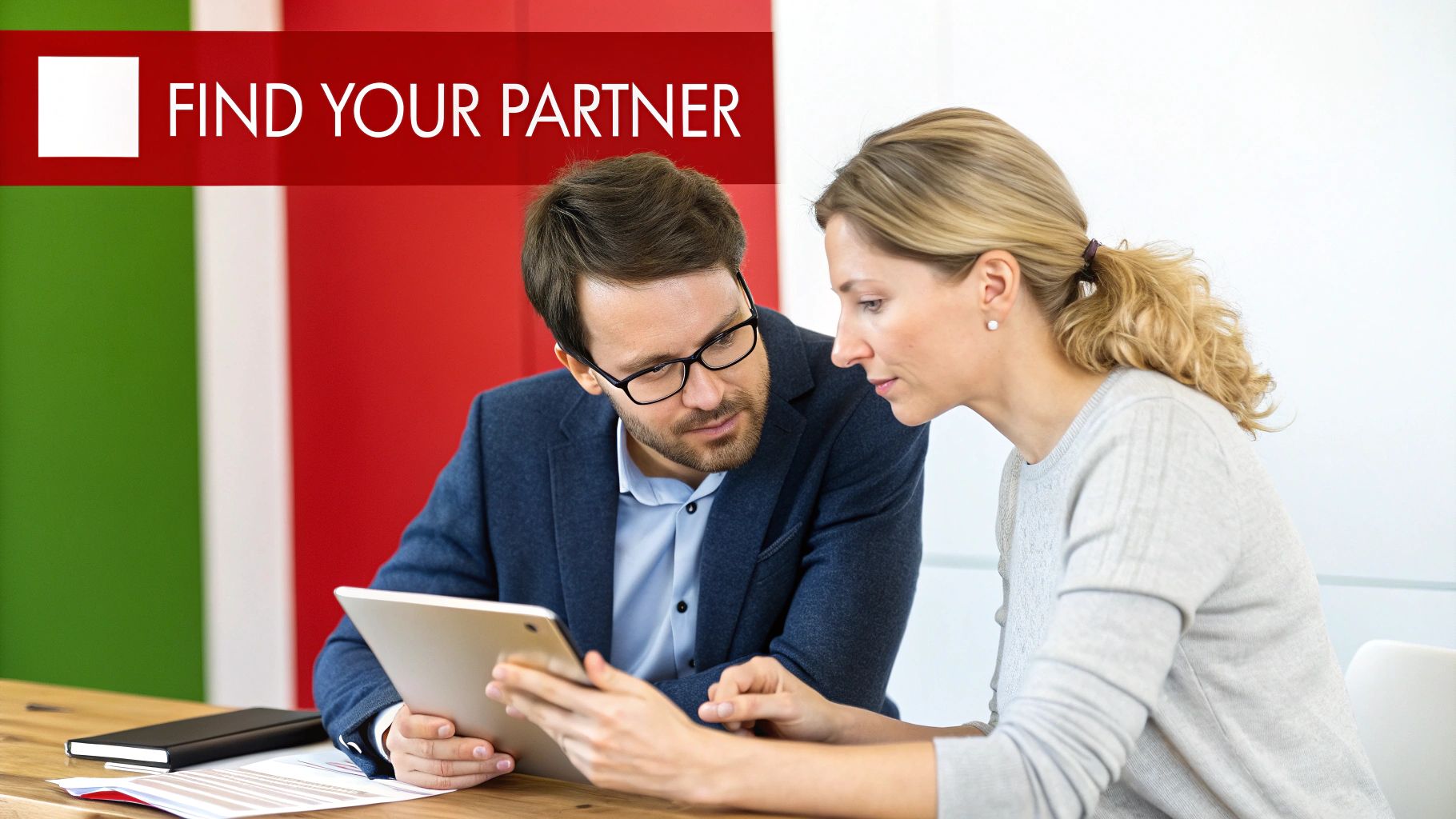 Two people in a Brisbane office collaborating on a WordPress website design.