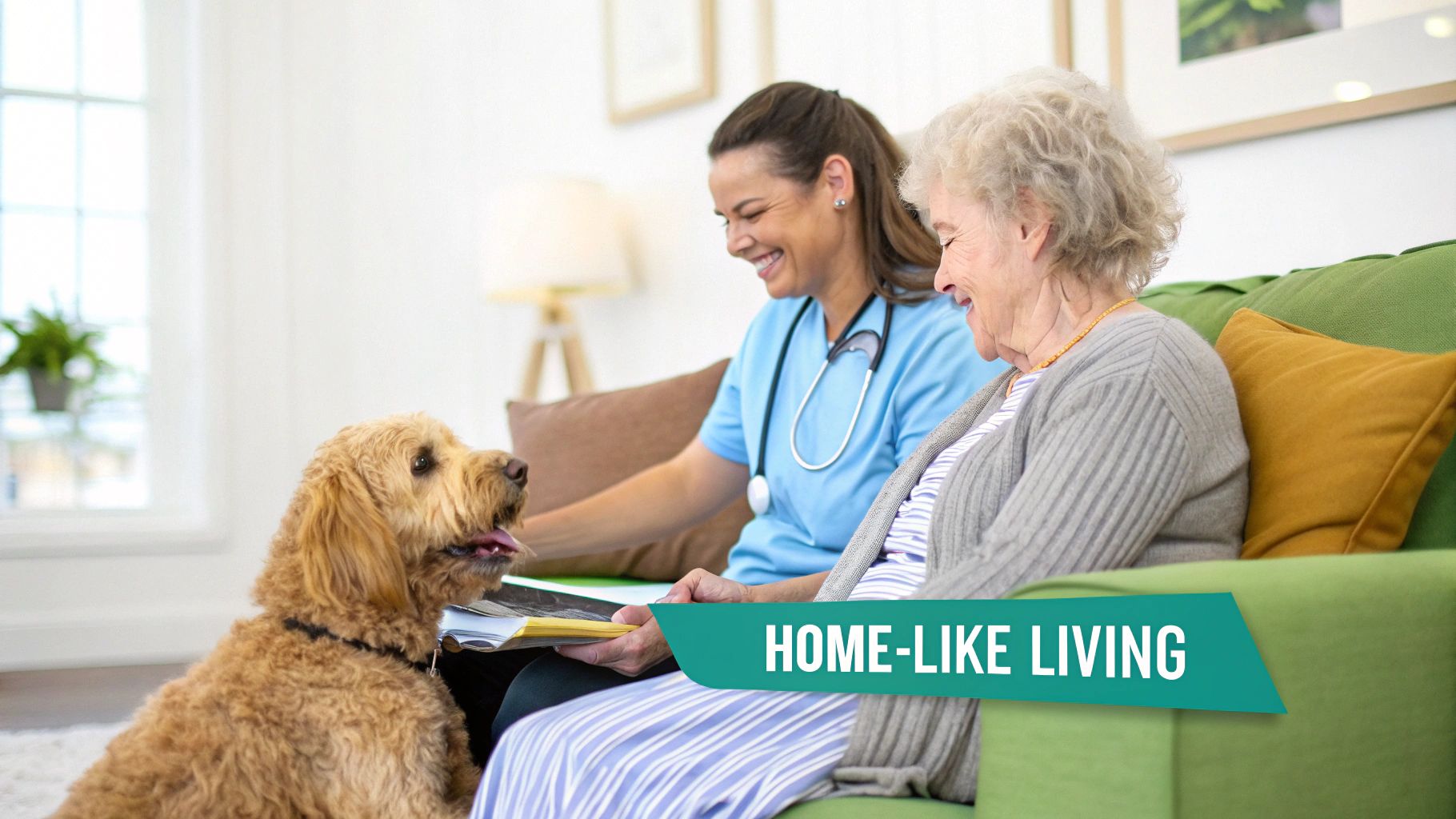 A smiling caregiver and senior woman read a book with a dog in a cozy living room.