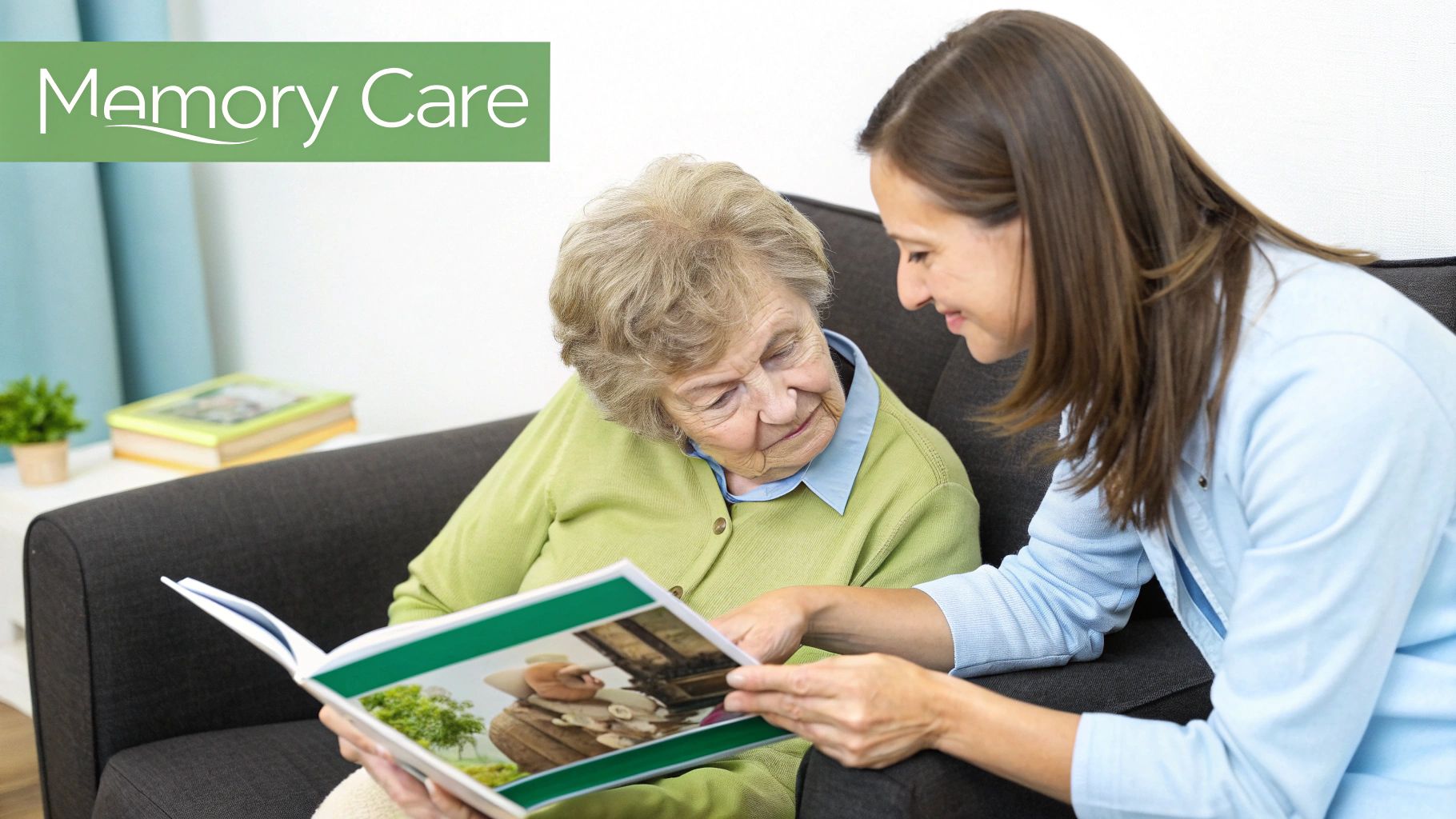An elderly woman and a younger woman happily looking at a photo album together on a couch, promoting memory care.