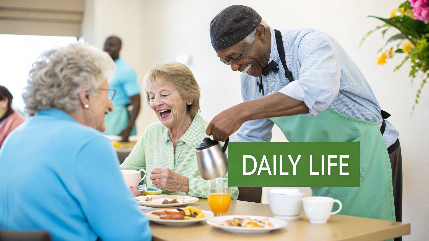 Happy elderly residents share a meal, with a staff member serving coffee and smiling.