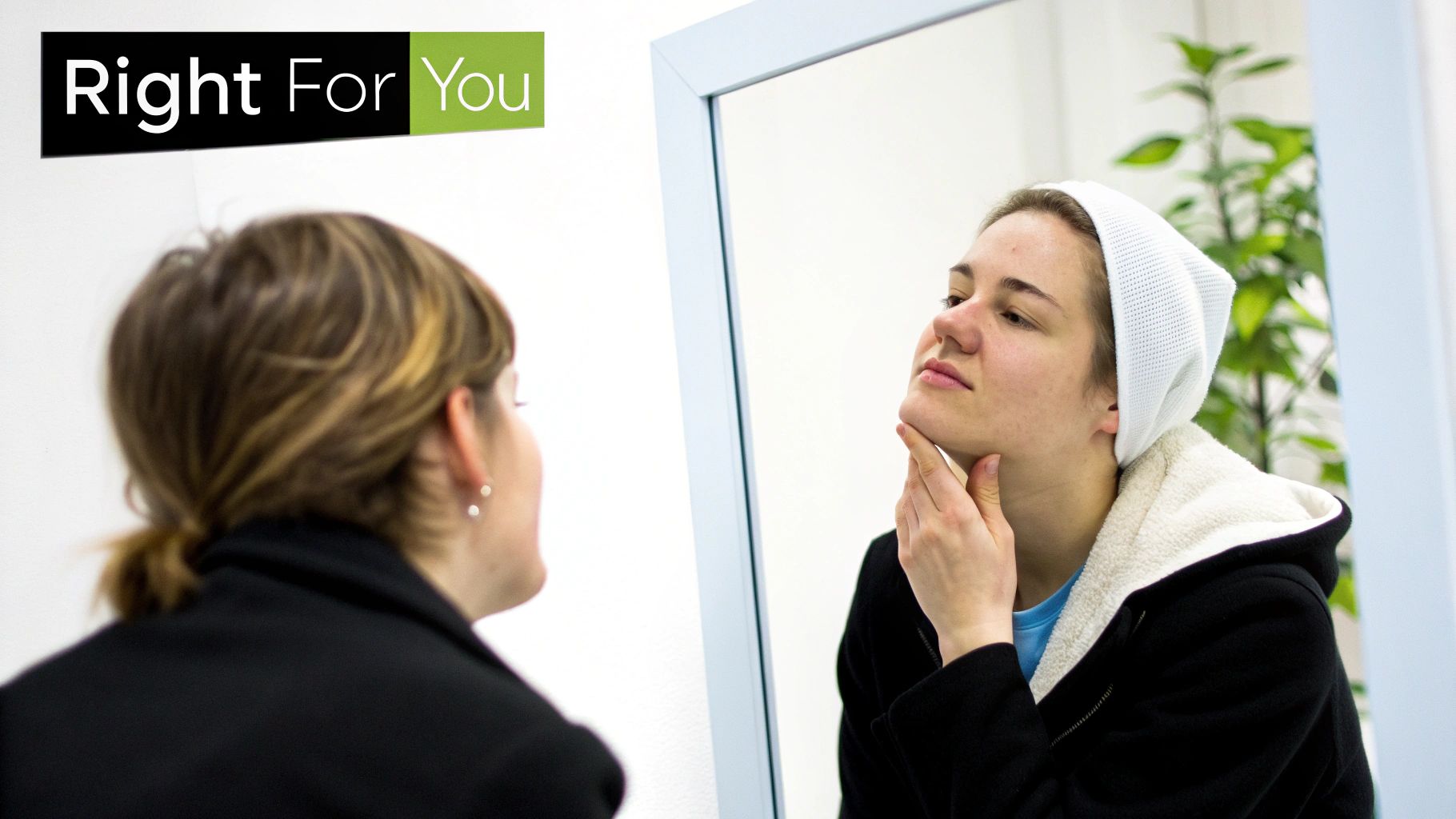 A woman with a thoughtful expression considering her skin.