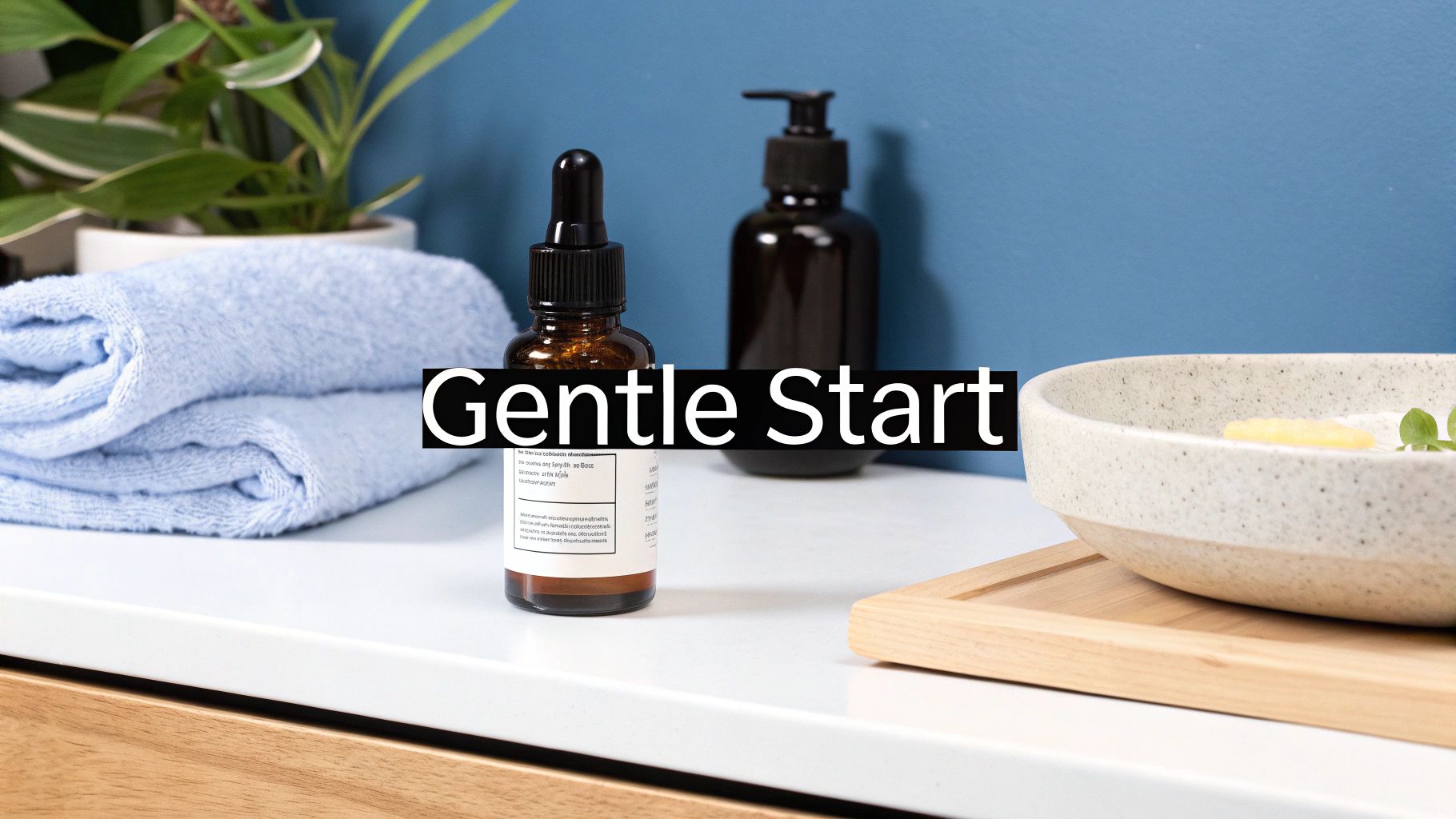 A clean bathroom counter with skincare products, including dropper and pump bottles, a blue towel, and a plant.