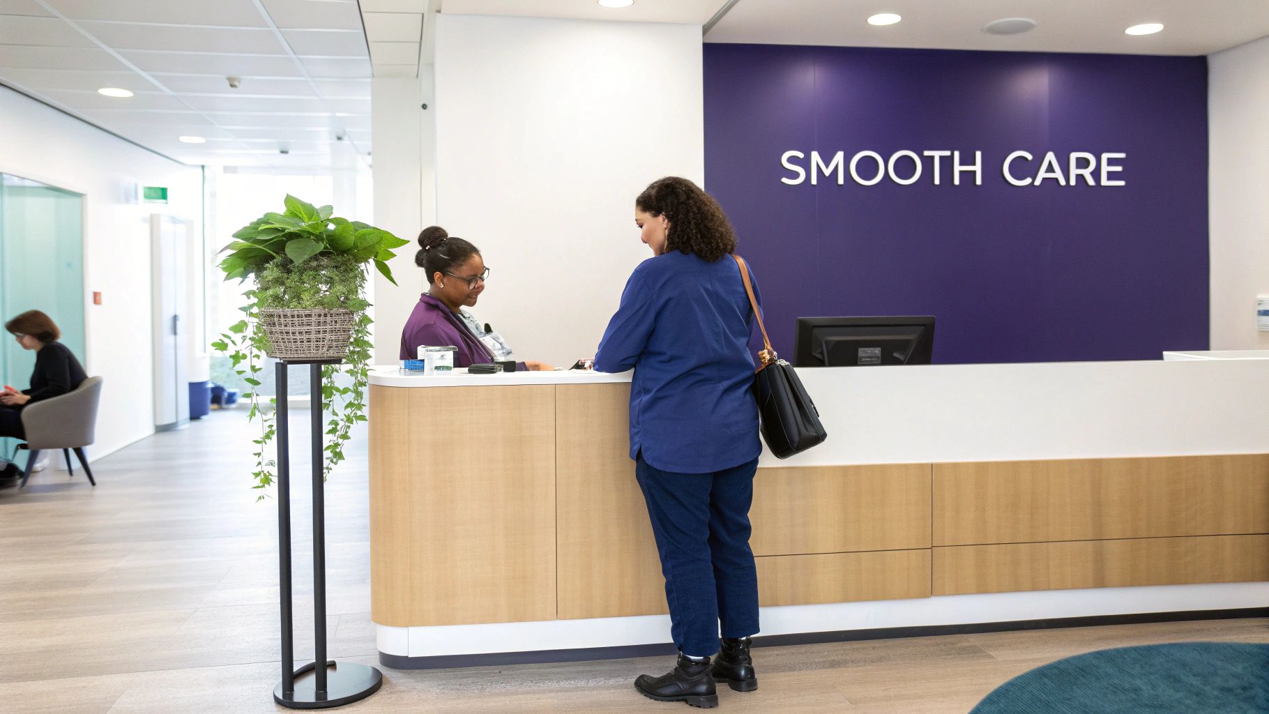A friendly receptionist assists a patient at the front desk of a modern healthcare facility.