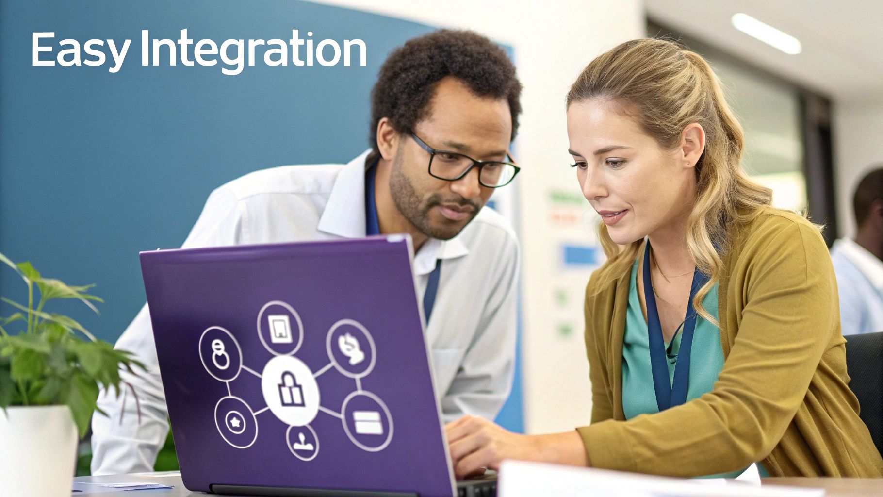 Two professionals collaborate on a purple laptop, displaying a security and integration diagram, with 'Easy Integration' text.