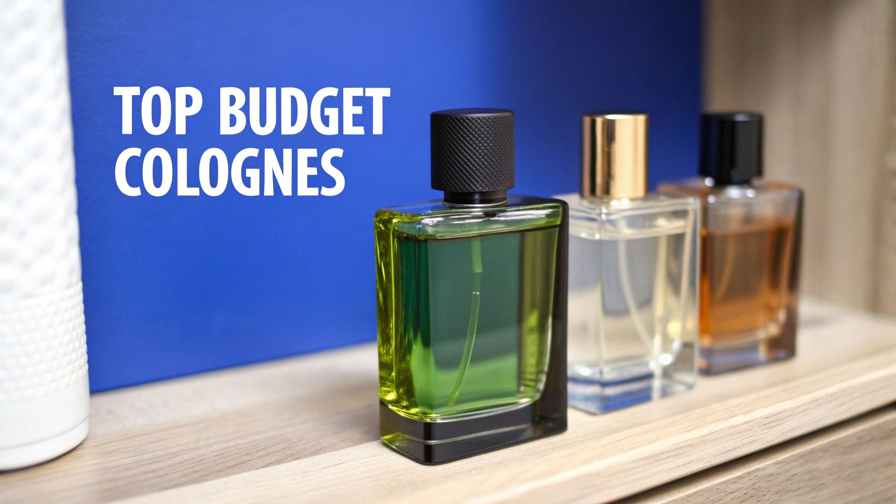 Three budget cologne bottles on a wooden shelf with a blue background that says 'TOP BUDGET COLOGNES'.