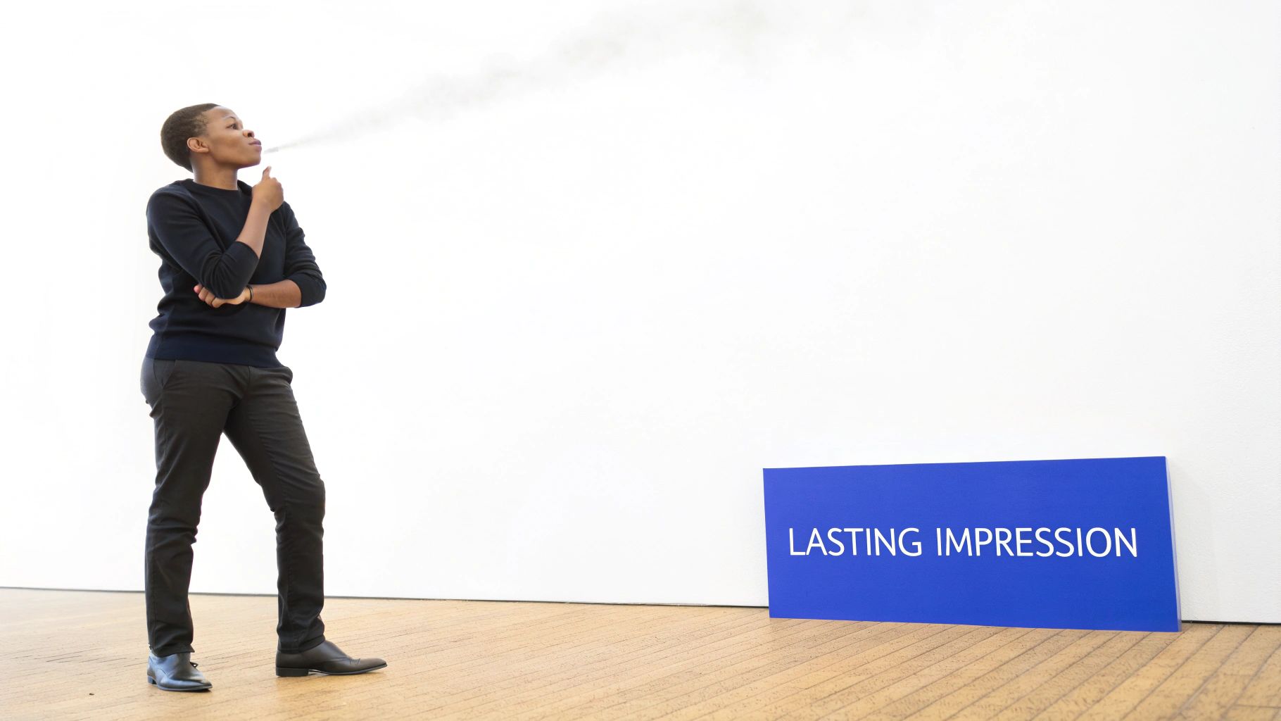 Person blowing white mist, likely applying cologne, next to a 'LASTING IMPRESSION' sign.
