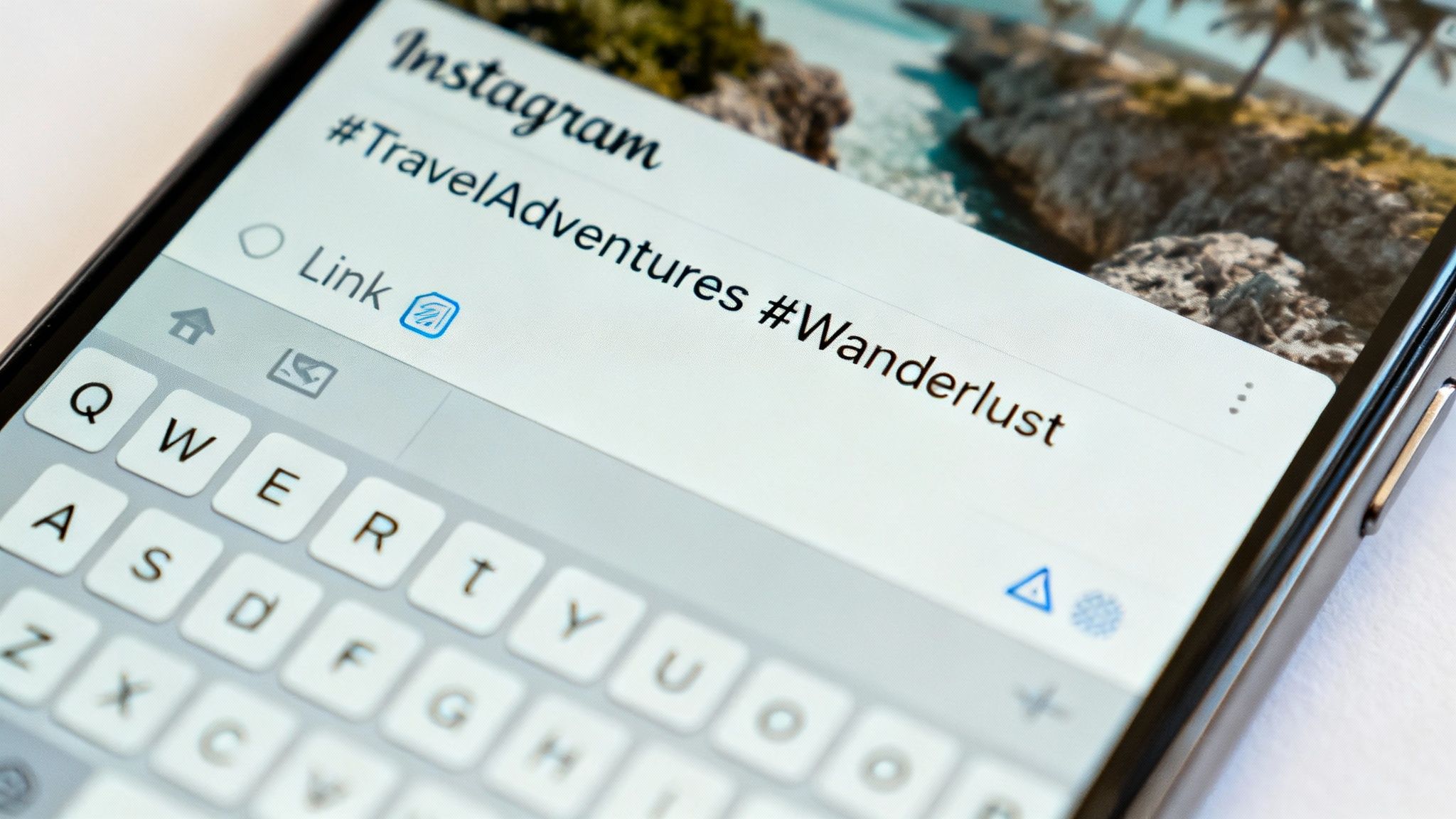 A person optimizing an Instagram post on their phone with caption and hashtags