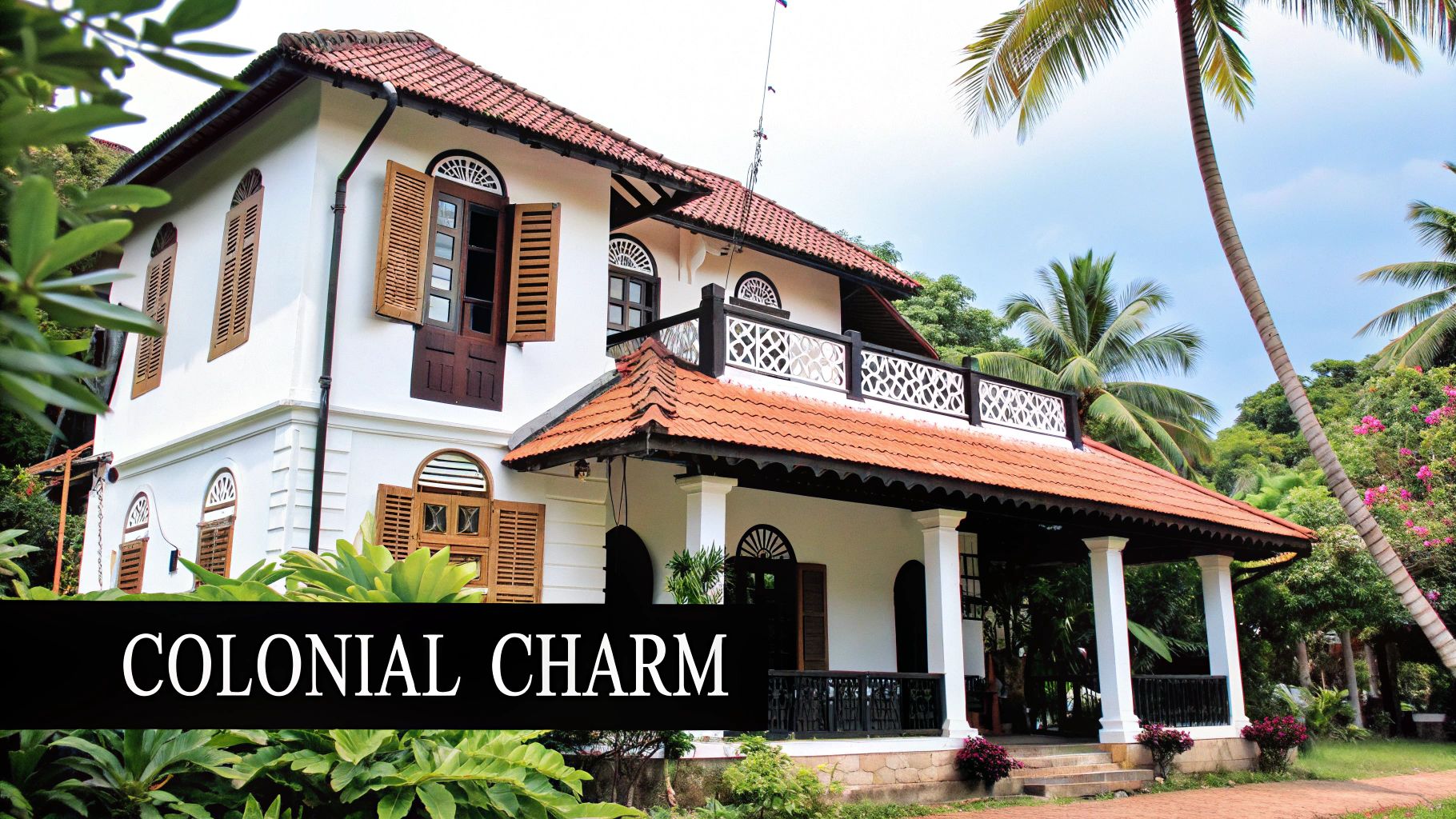 A serene view of The Boma Guest House Entebbe's garden and building exterior