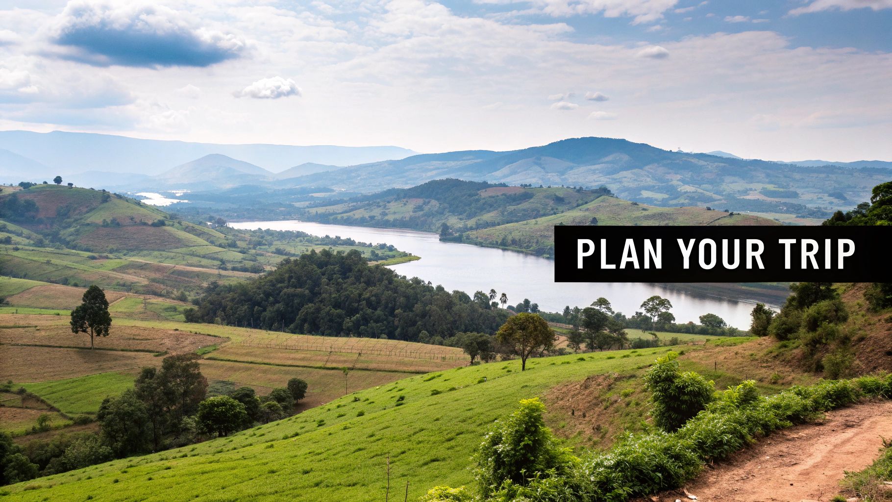 A serene river landscape in Uganda with lush green banks and calm waters