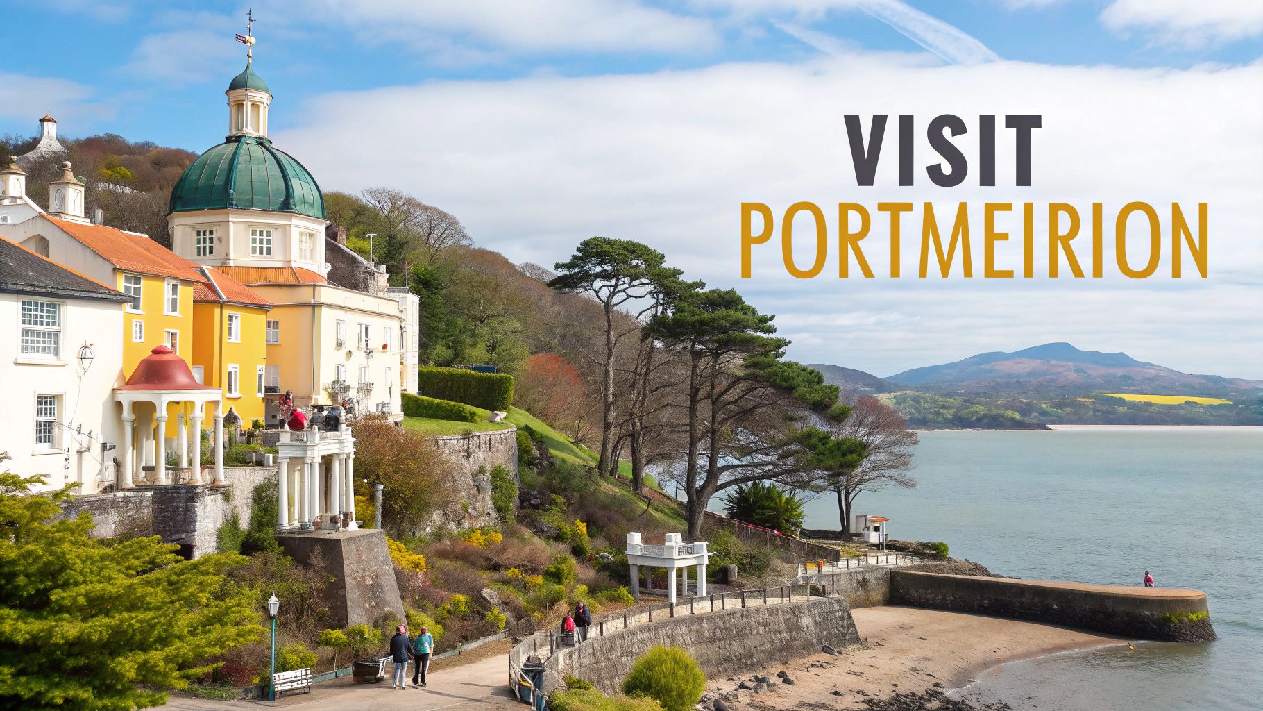View of Portmeirion village in North Wales, with colorful buildings, a large green dome, people walking, and a calm bay.