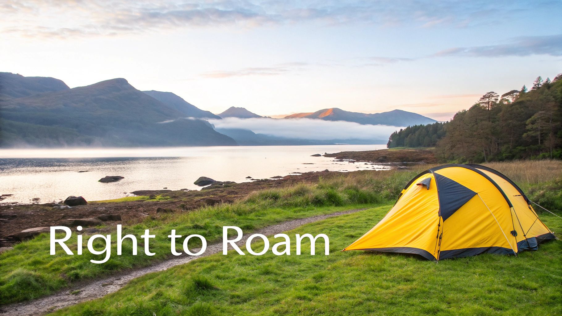 Yellow tent set on a grassy path by a misty loch and mountains at sunrise, symbolizing wild camping.