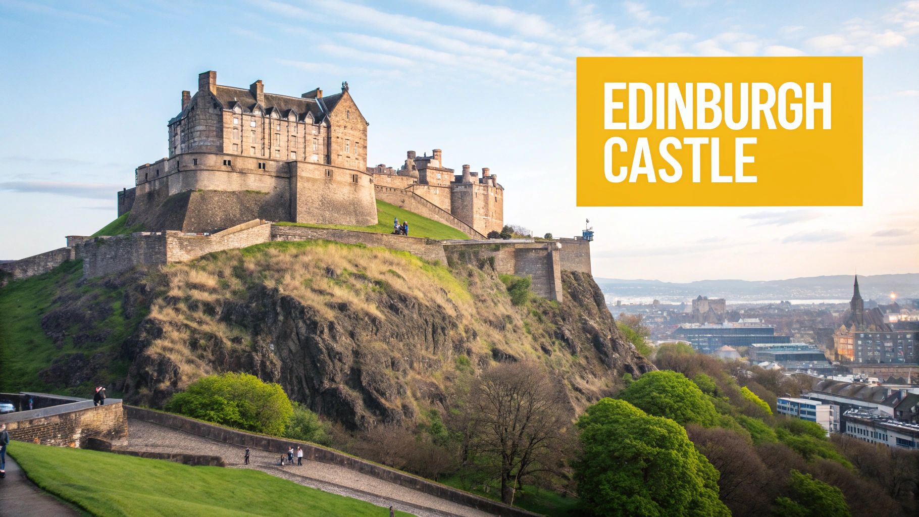 Historic Edinburgh Castle, a grand fortress, sits atop a volcanic rock overlooking the city.