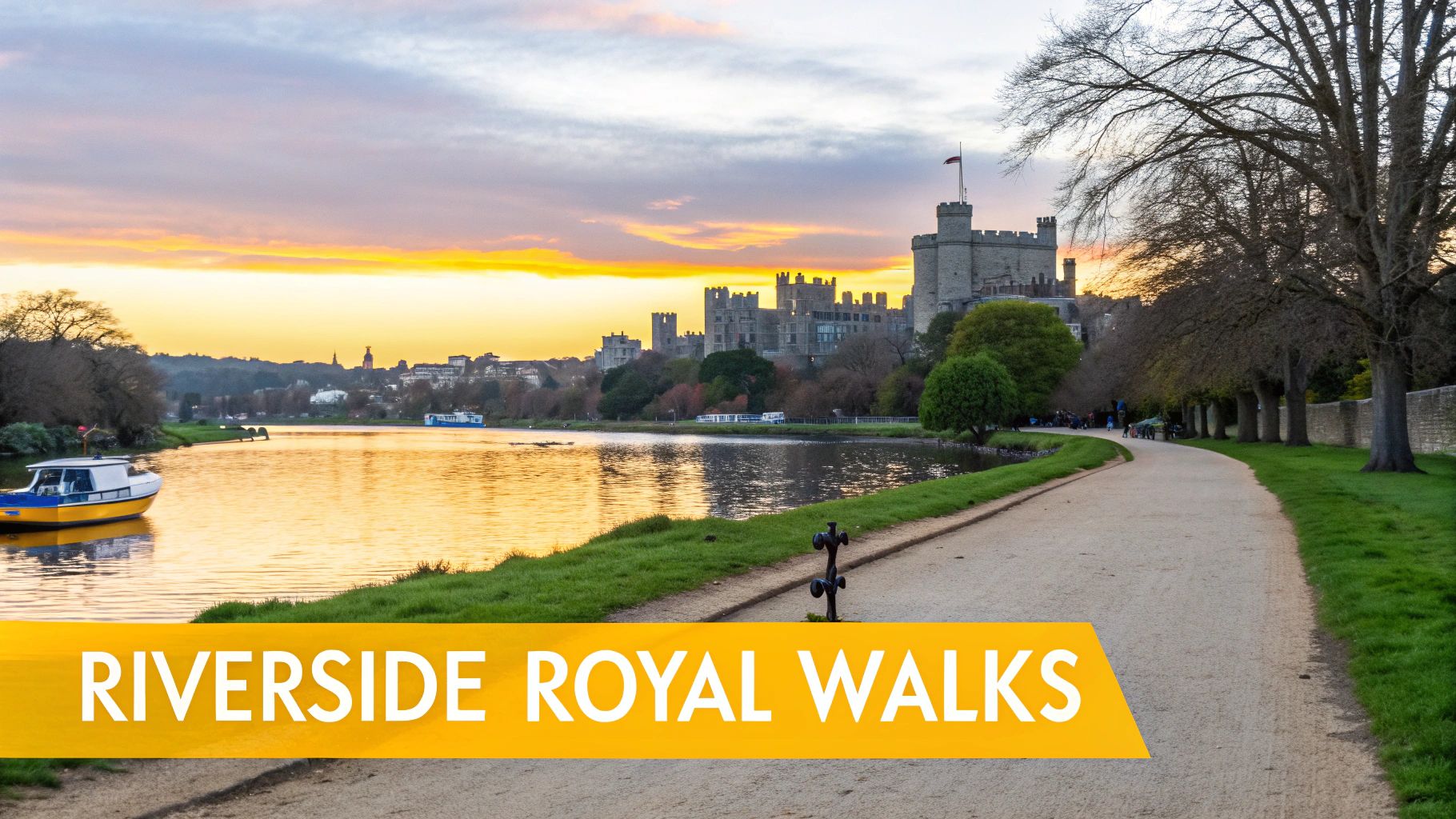 Warwick Castle towering over a serene river at sunset, with a tranquil path alongside.
