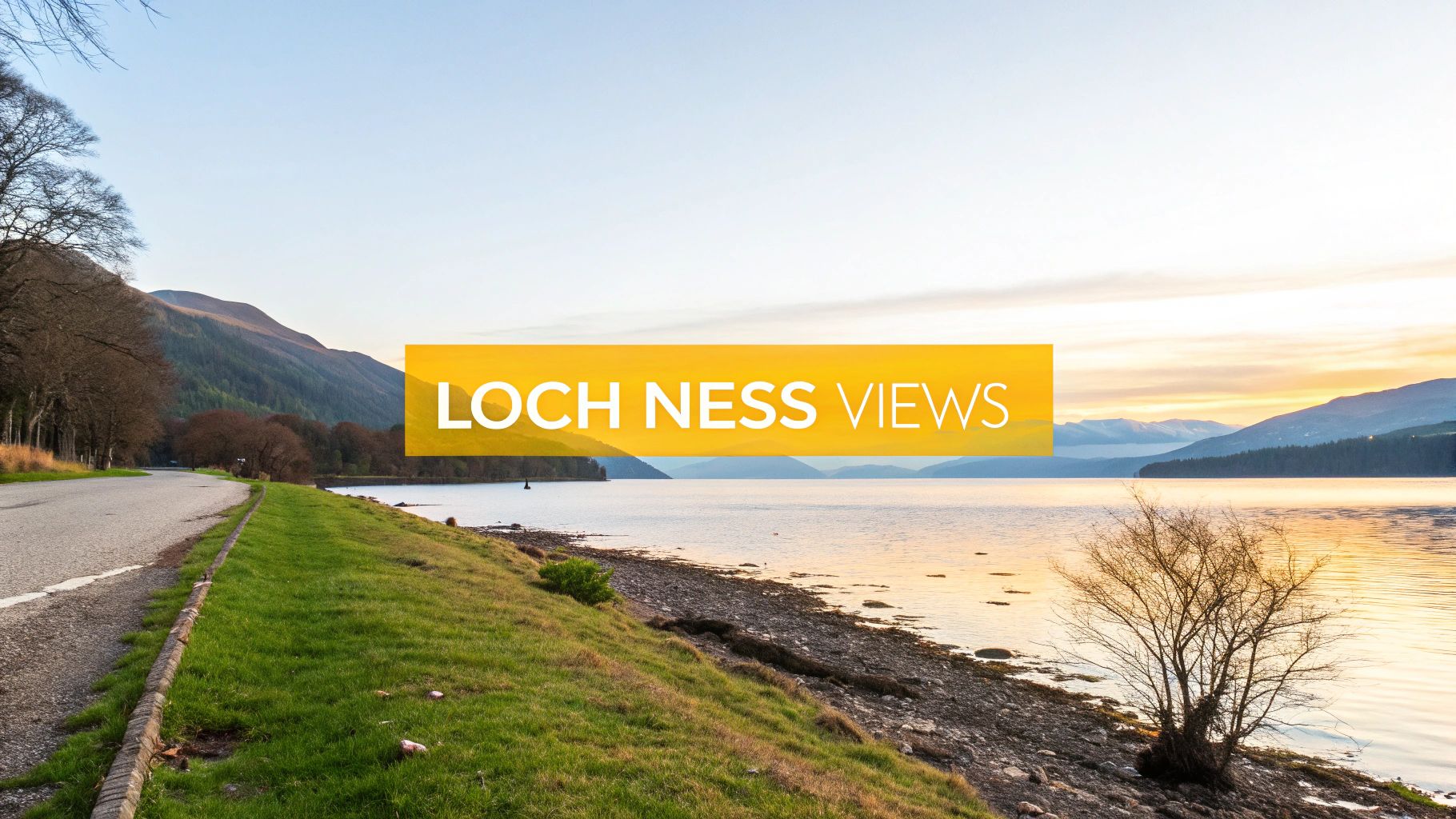 A scenic view of Loch Ness at sunset, with a road, grassy bank, and distant mountains.