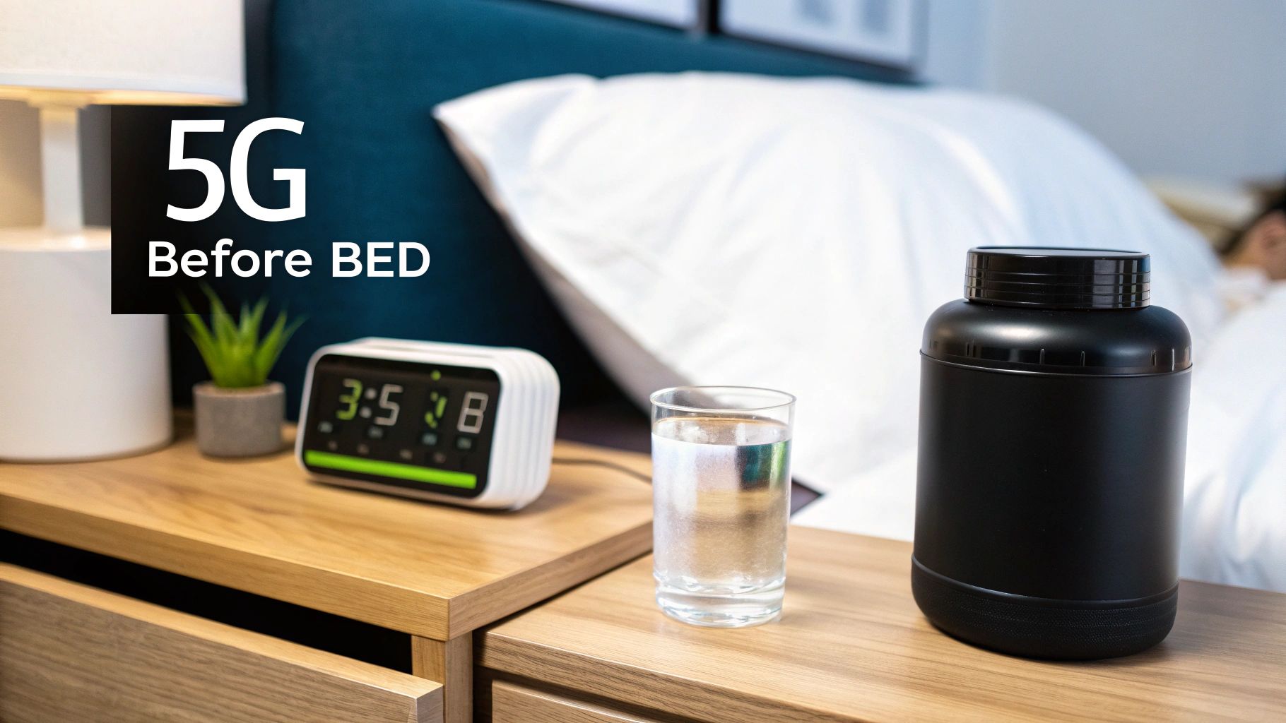A scoop of creatine powder next to a glass of water on a nightstand.
