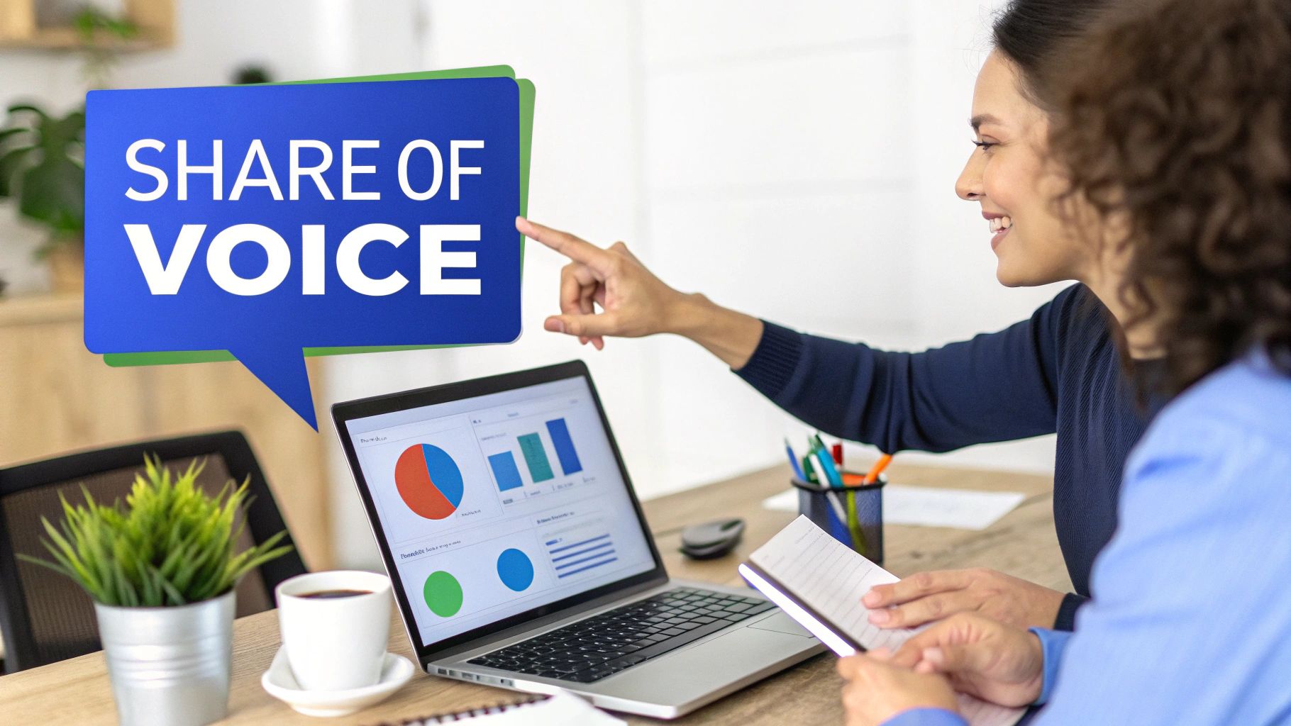 Two happy colleagues analyze 'Share of Voice' data on a laptop displaying charts and graphs.