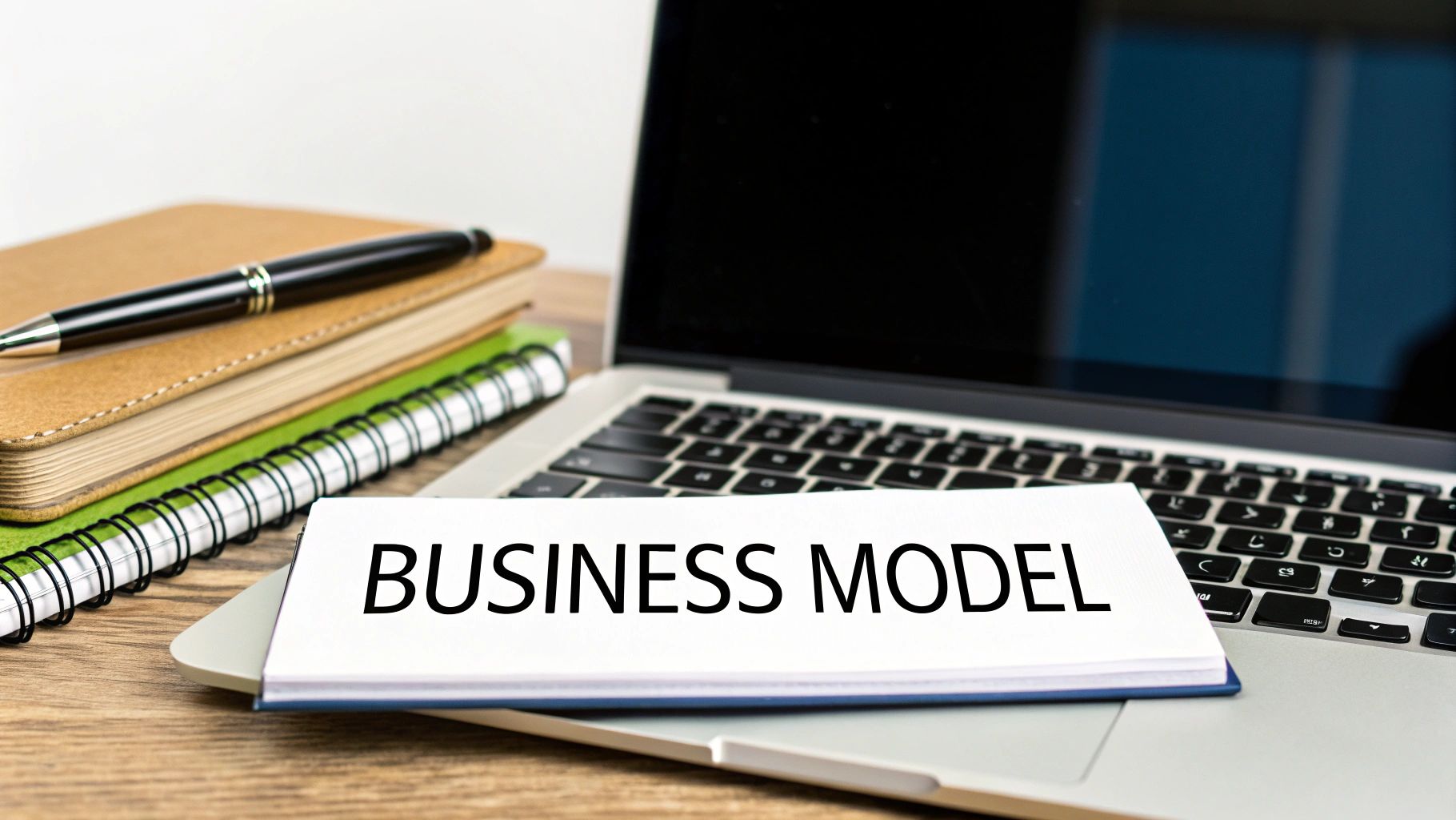 A team collaborating around a whiteboard, mapping out business and marketing strategies.