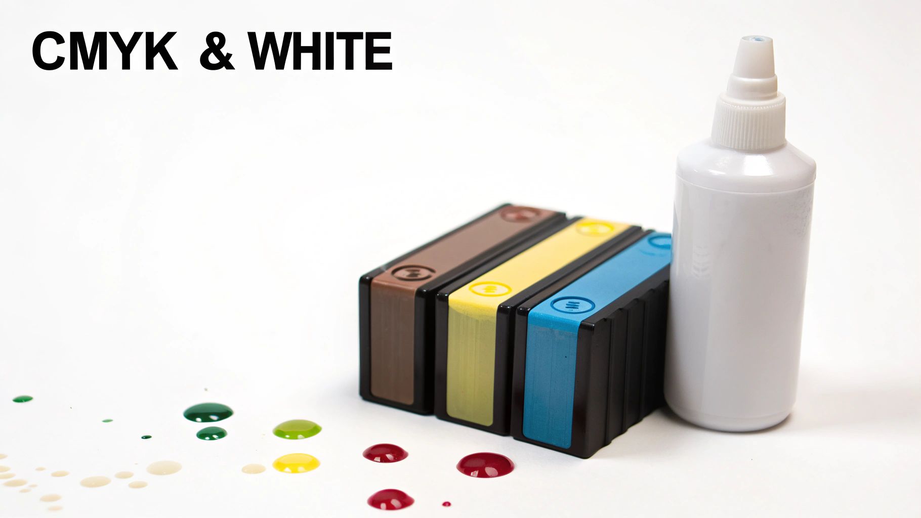 CMYK and white printer inks, cartridges, and colorful drops on a clean white surface.