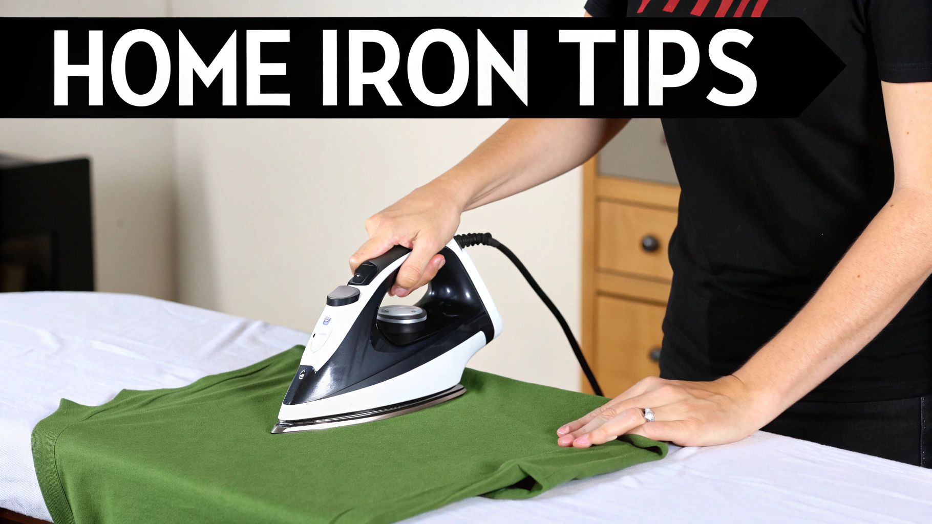 A person ironing a green shirt with a white and black iron on an ironing board, with 'HOME IRON TIPS' text overlay.