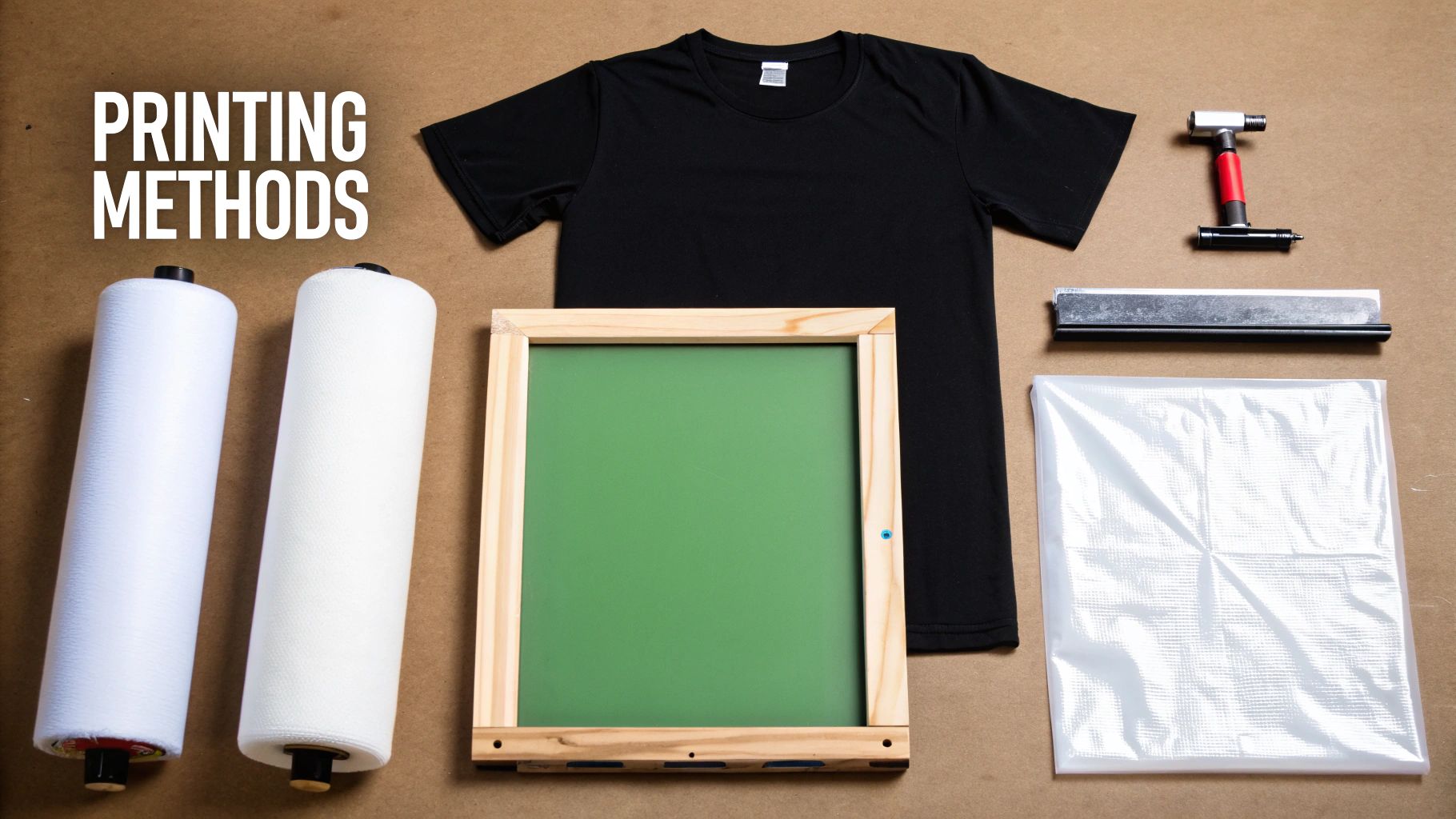 A flat lay showcasing various screen printing tools and materials on a brown surface.