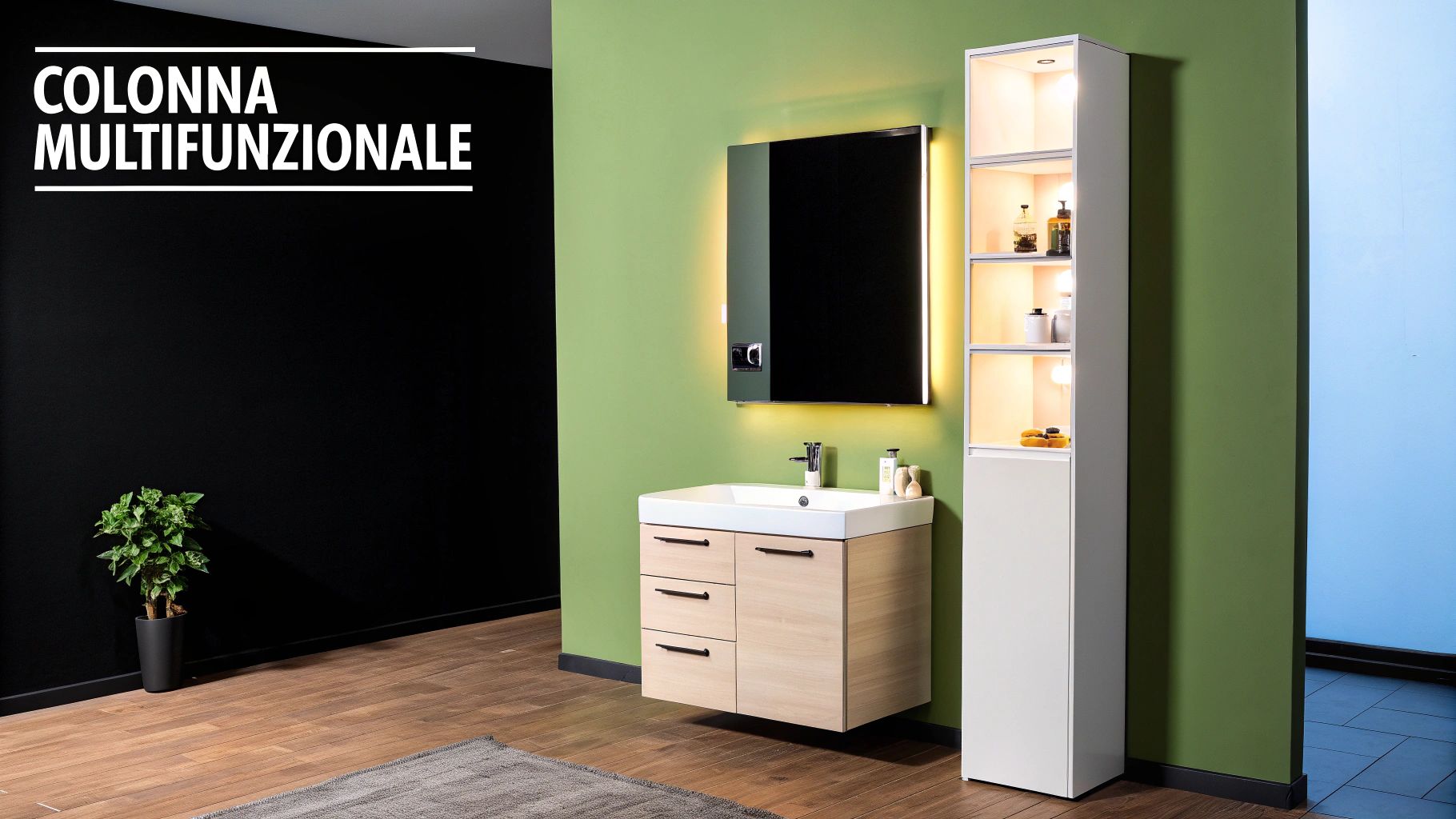 Bagno moderno con mobile lavabo in legno chiaro, specchio illuminato e colonna multifunzionale bianca su parete verde.
