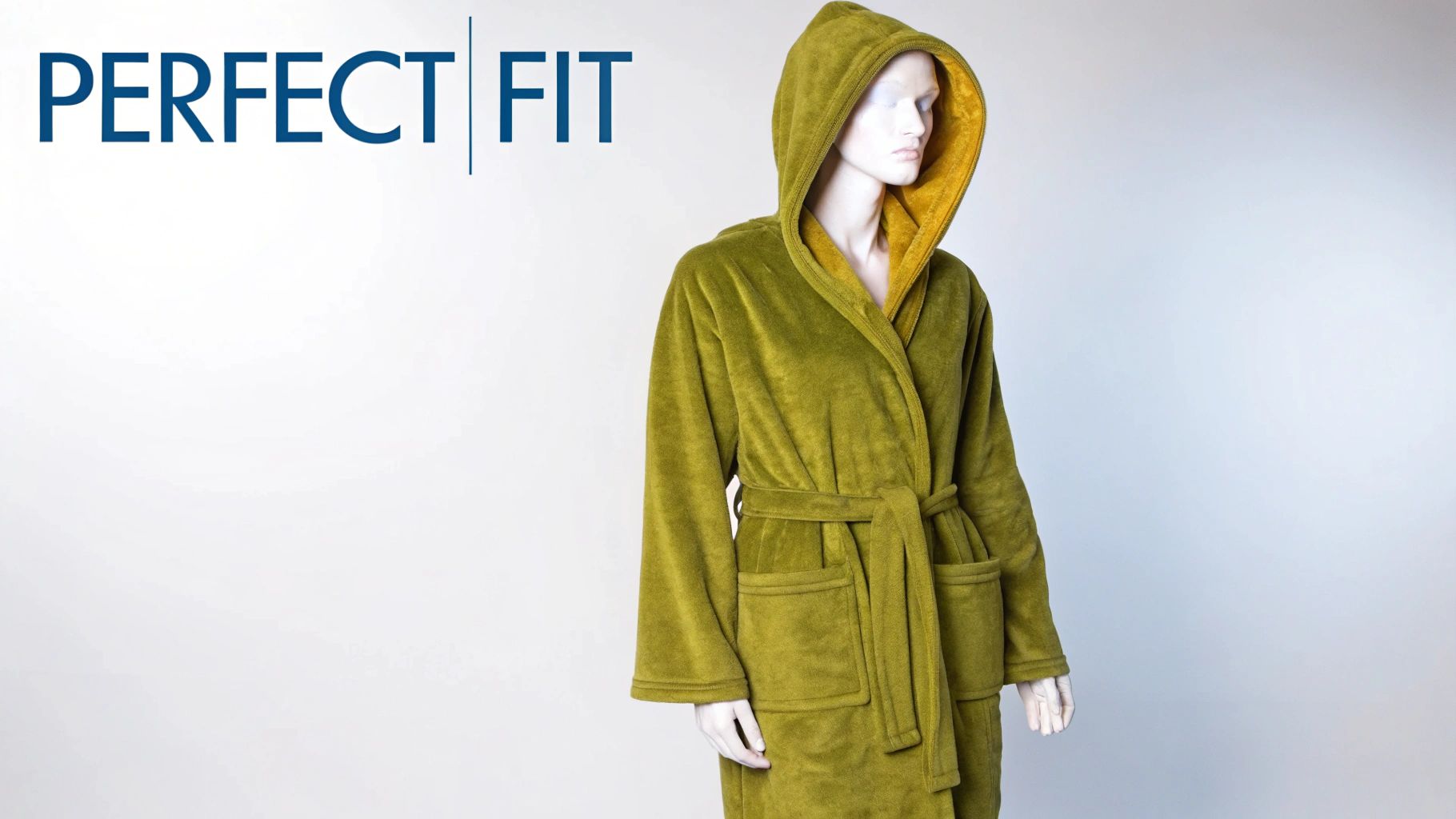 A woman wearing a comfortable plush robe at home.