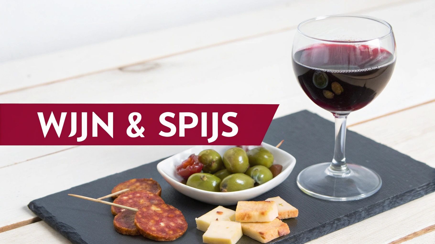 Een prachtig gedekte tafel met diverse gerechten en een glas Rioja wijn