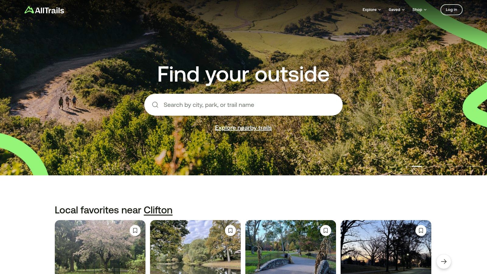 A person using the AllTrails app on a smartphone to navigate a hiking trail.