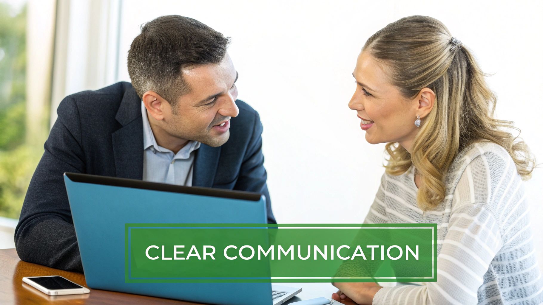 A client and attorney discussing documents during a consultation