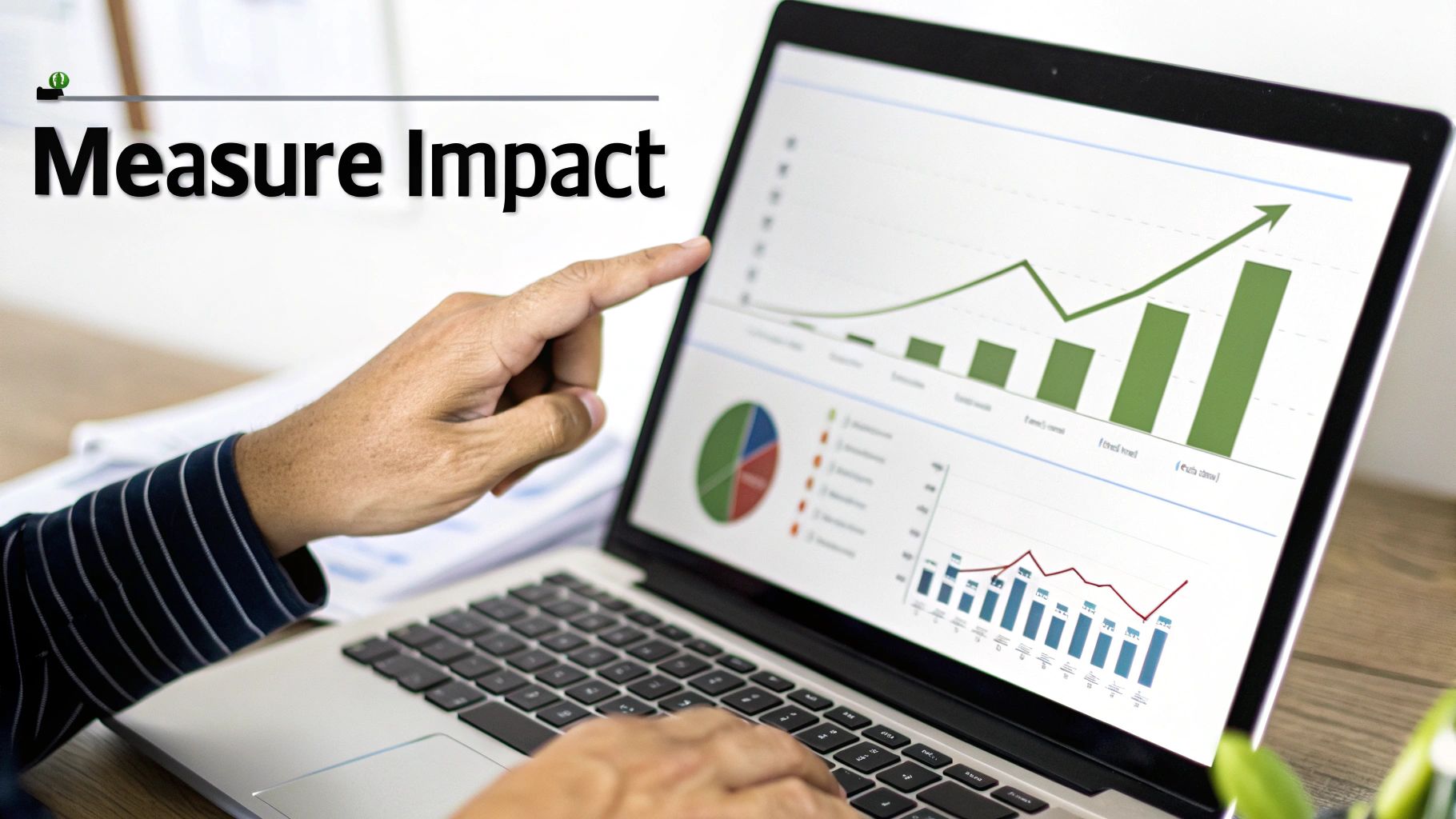A person analyzes business performance charts on a laptop screen with the text 'Measure Impact'.