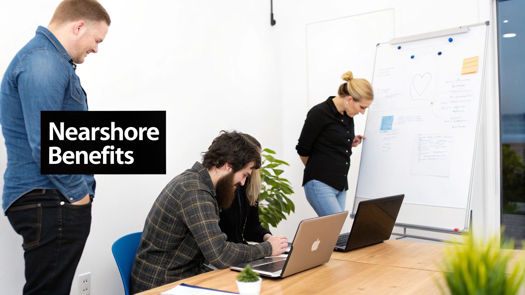 A team collaborating in a bright office, with 'Nearshore Benefits' overlay, discussing ideas at a whiteboard and working on laptops.