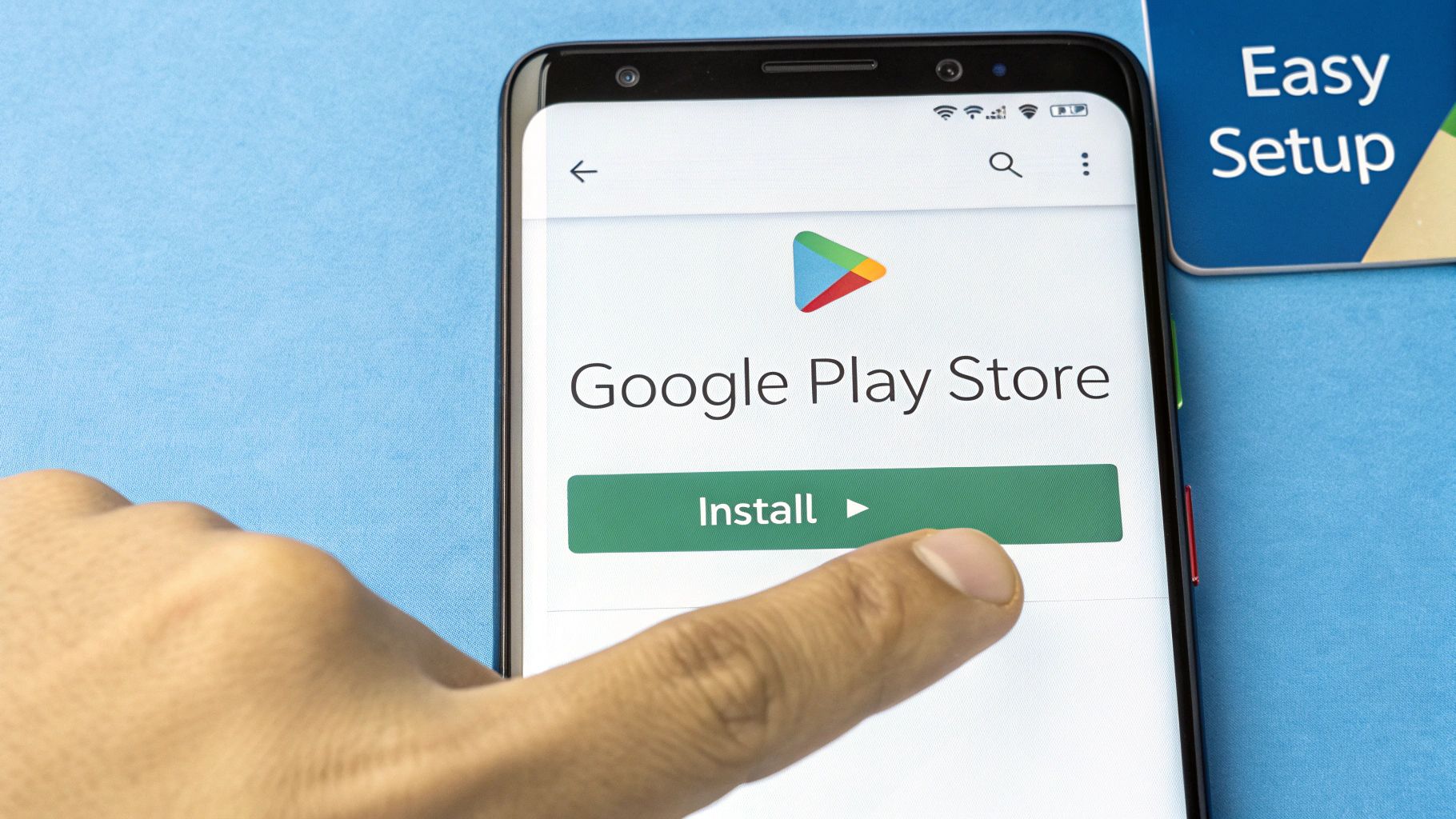 A finger tapping the install button for an app on an Android phone's screen.