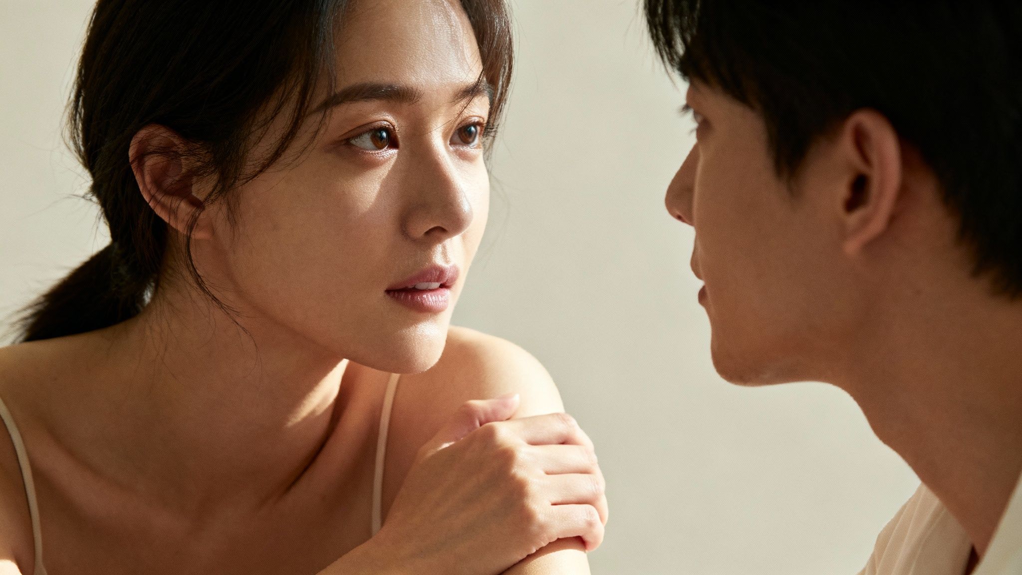 Woman and man having serious intimate conversation showing emotional communication and active listening skills