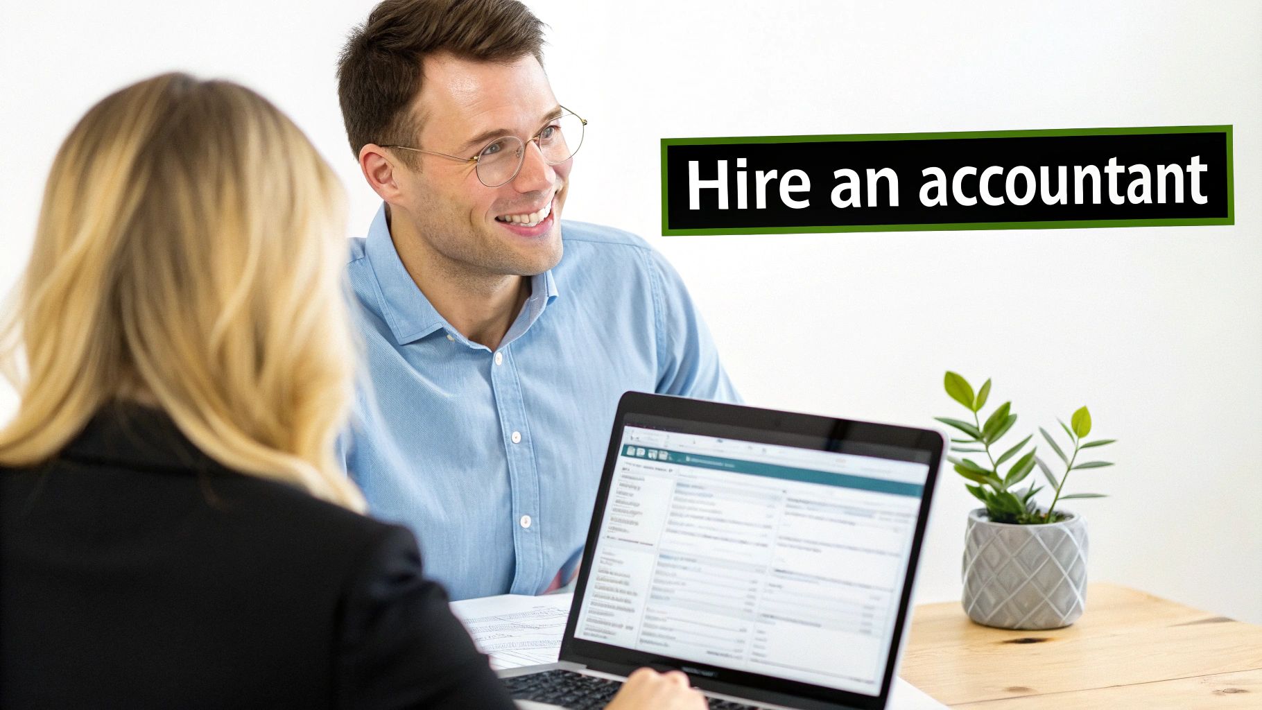 A smiling man and a woman using a laptop in an office, with 'Hire an accountant' text.
