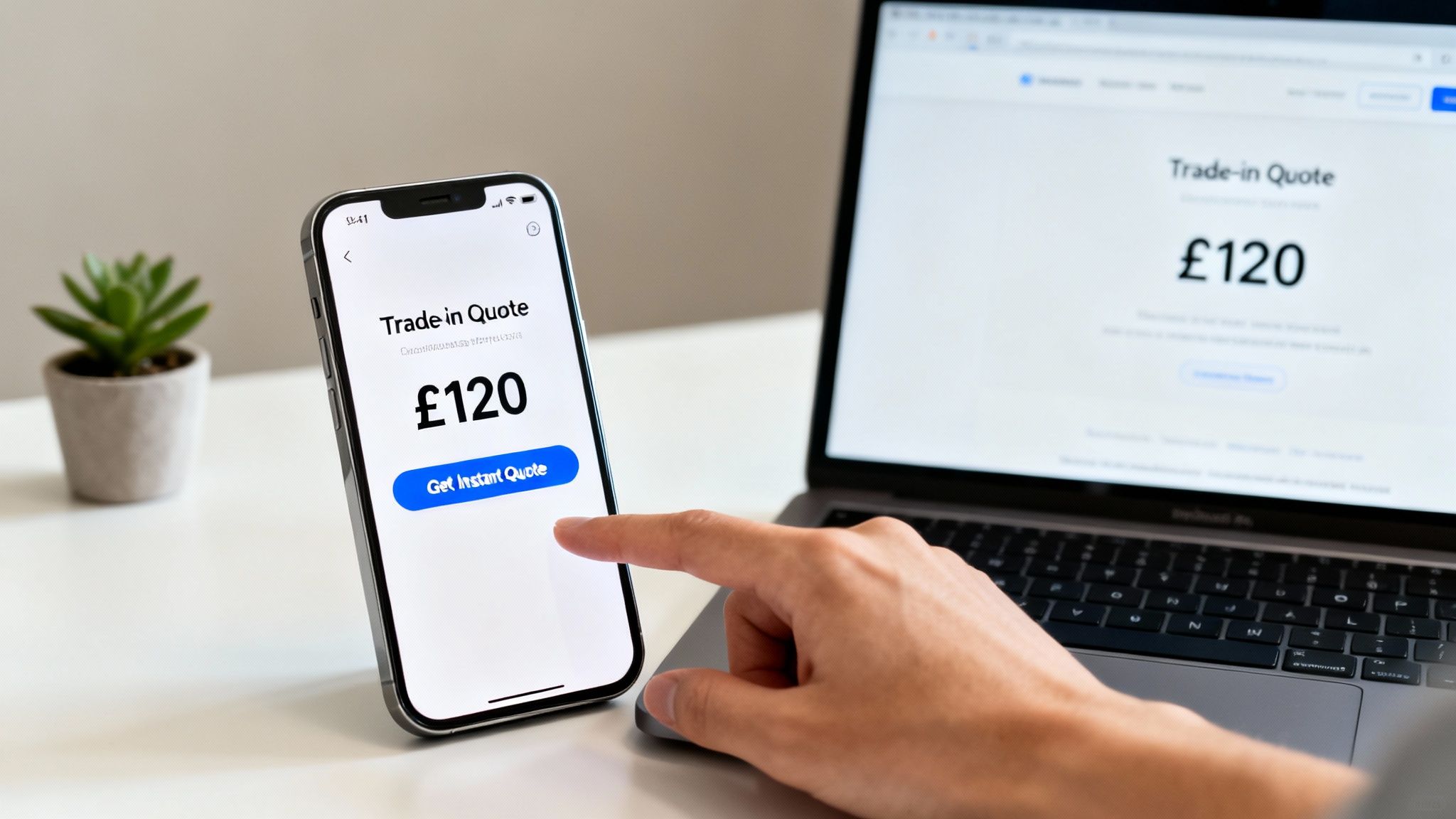 A person getting an instant trade-in quote of &pound;120 on a smartphone and laptop.