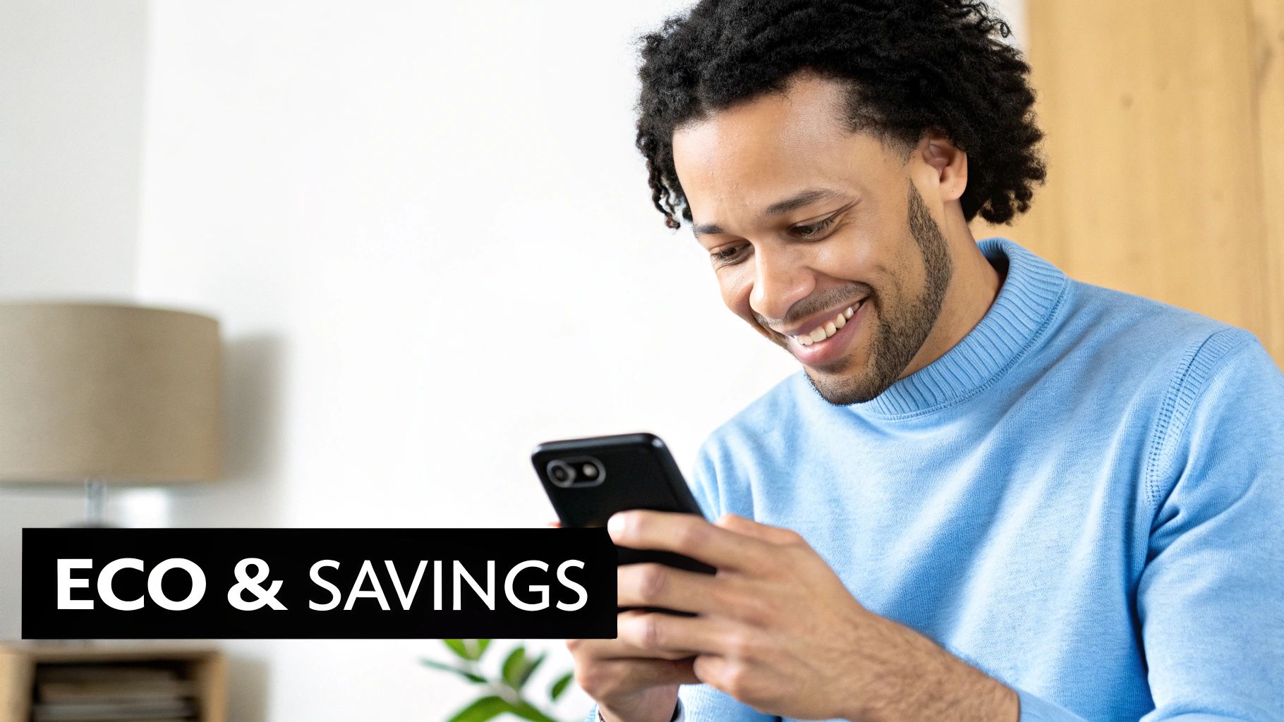 A person's hands holding a refurbished smartphone, closely inspecting its quality in a brightly lit, clean environment.