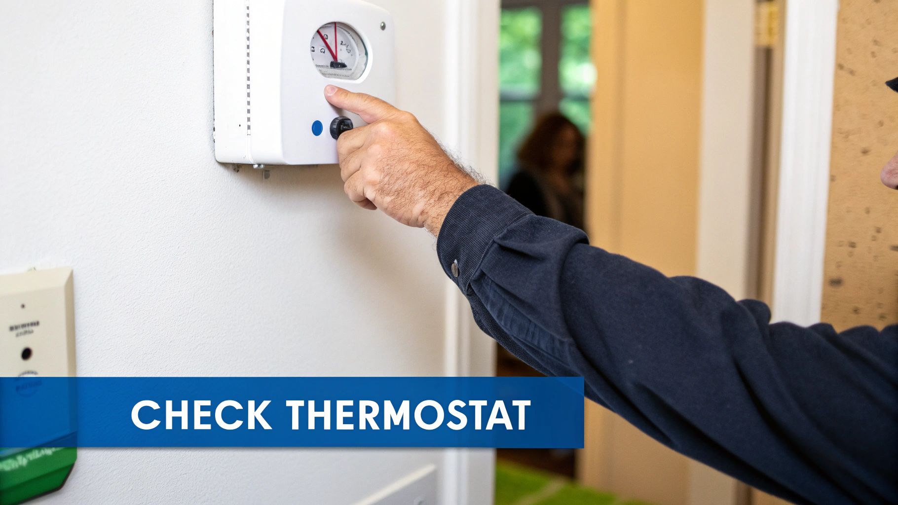 A person's hand adjusts a white analog thermostat on a wall, with 'CHECK THERMOSTAT' text.