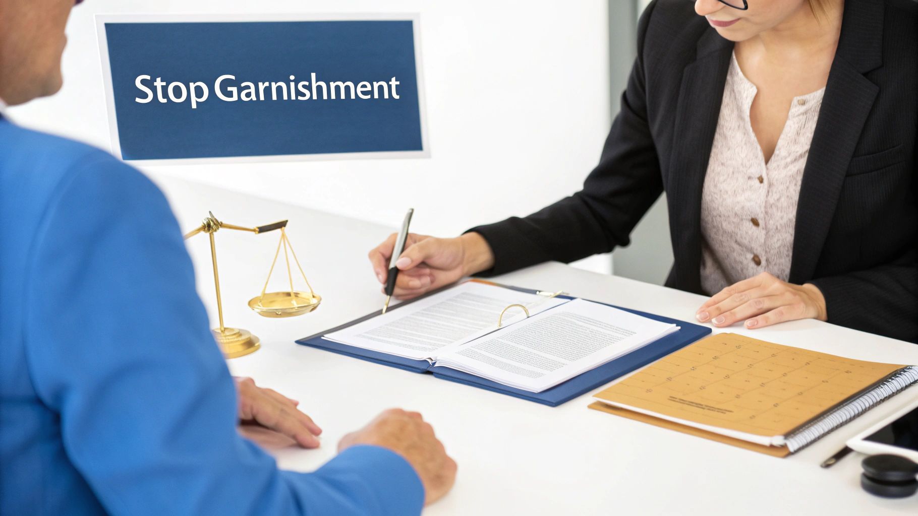 Lawyer helps client with legal documents to stop wage garnishment, scale of justice on desk.