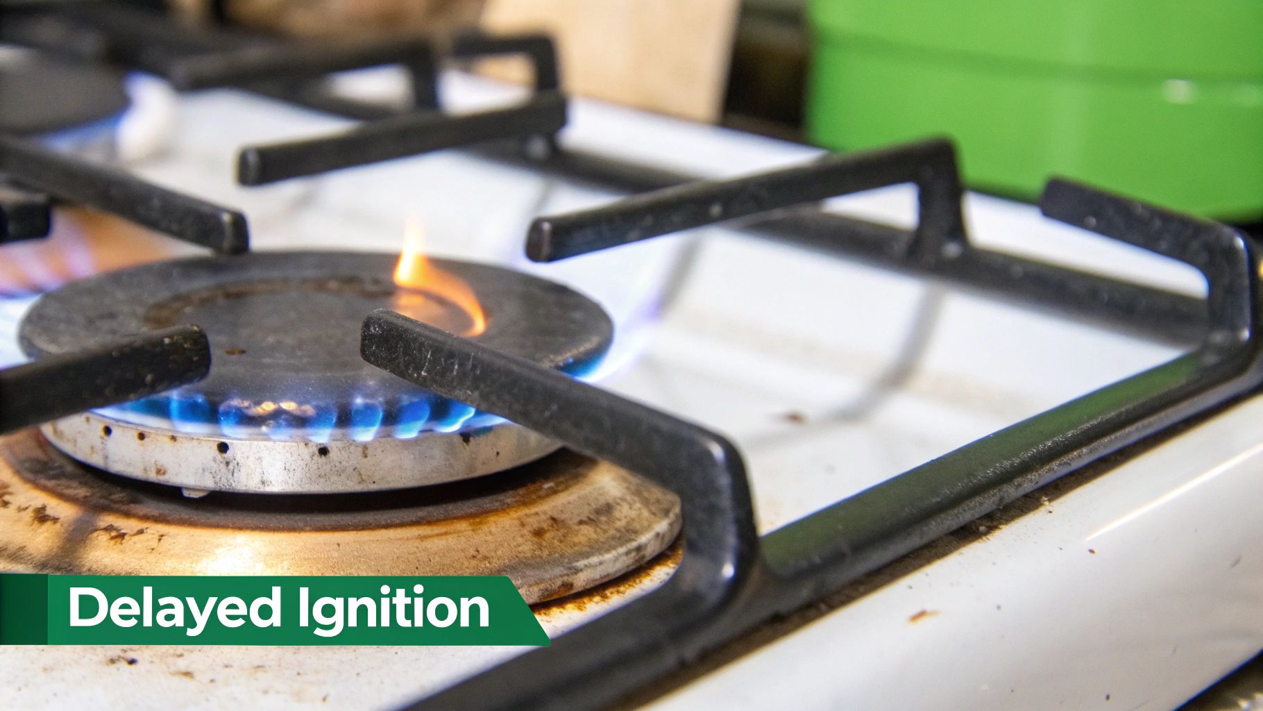 A gas stove burner with blue and orange flames, suggesting delayed ignition.