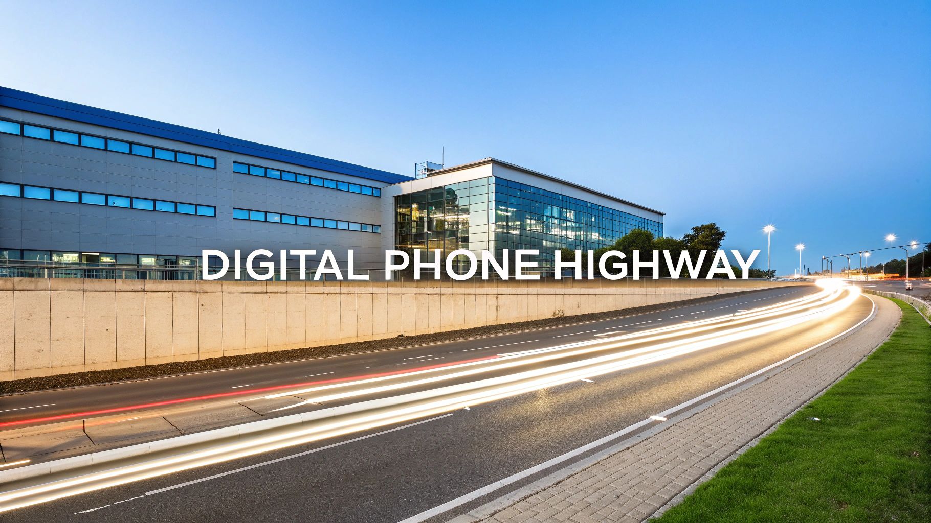 Modern office building beside highway with light trails representing digital phone highway connectivity